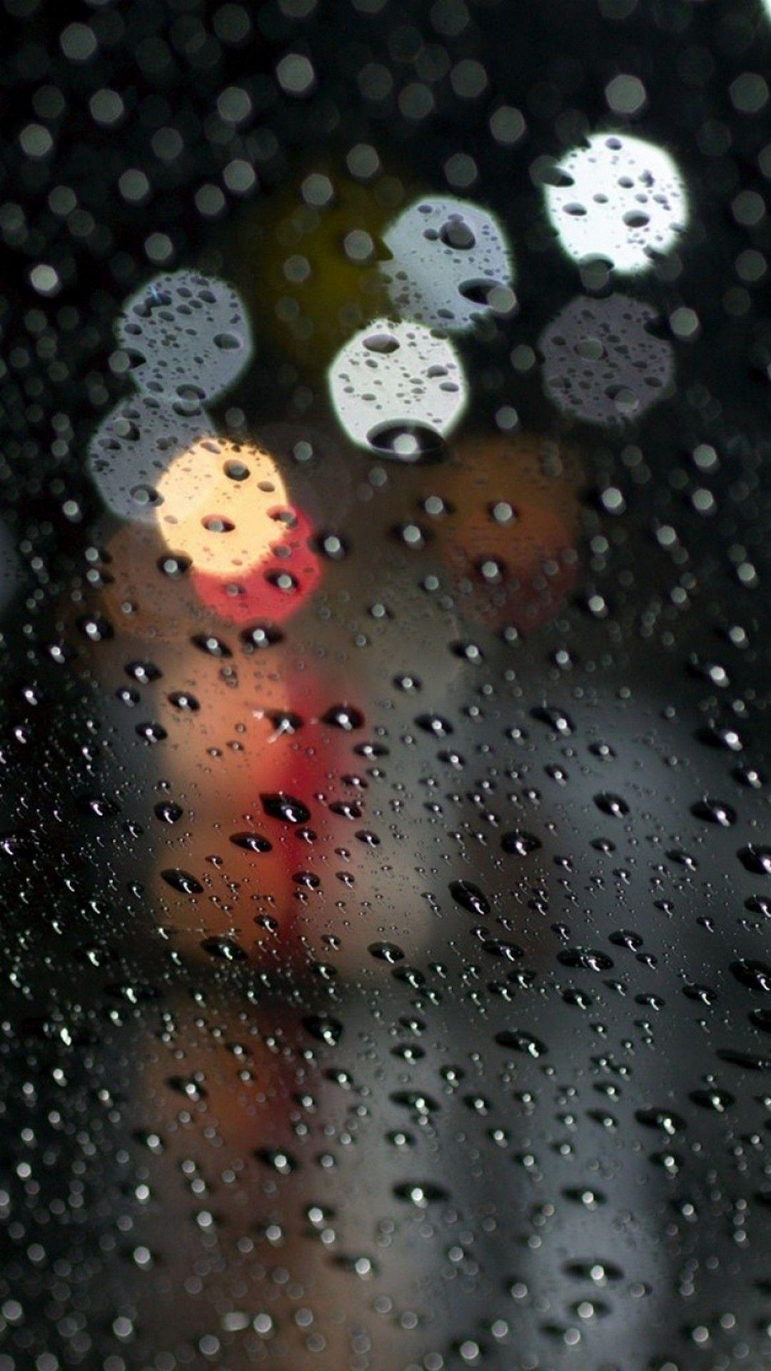 Download wallpaper 1280x2120 raindrops on glass rain night of city  bokeh iphone 6 plus 1280x2120 hd background 29238