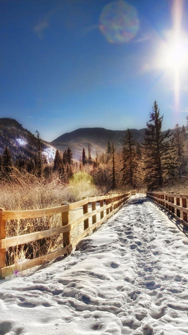 750x1334 Sun Snow Road iPhone 6s Wallpaper HD