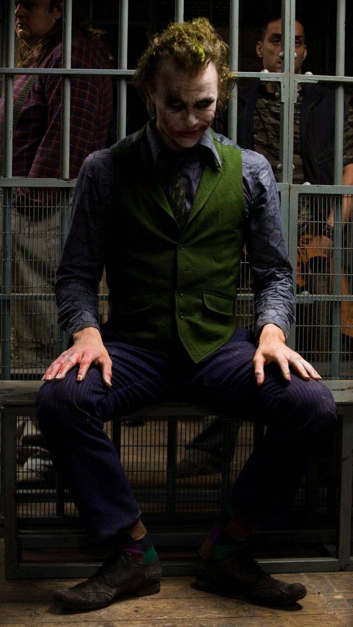 721x1280 Joker In Jail Wallpaper