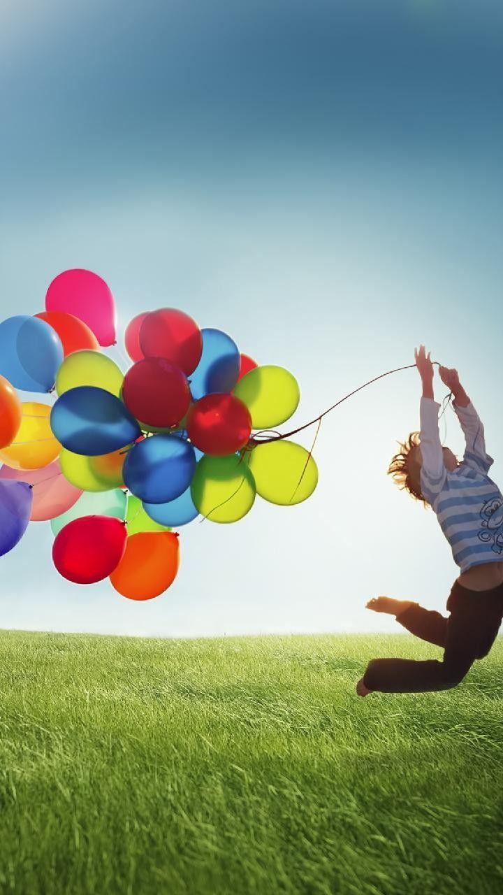 720x1280 Colorful balloons on a beautiful green meadow walpaper on samsung
