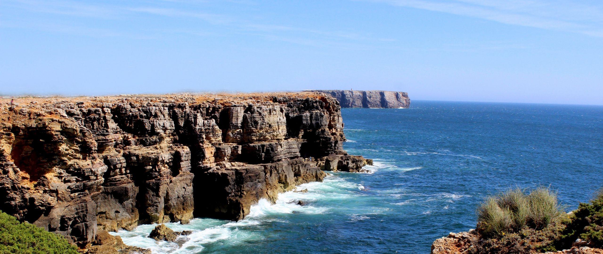 2560x1080 Download wallpaper 2560x1080 algarve, portugal, ocean, rock