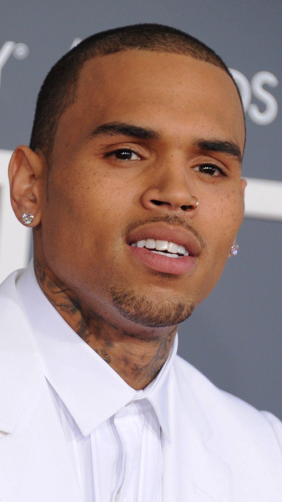 938x1668 Download wallpaper 938x1668 chris brown, conflict, prison