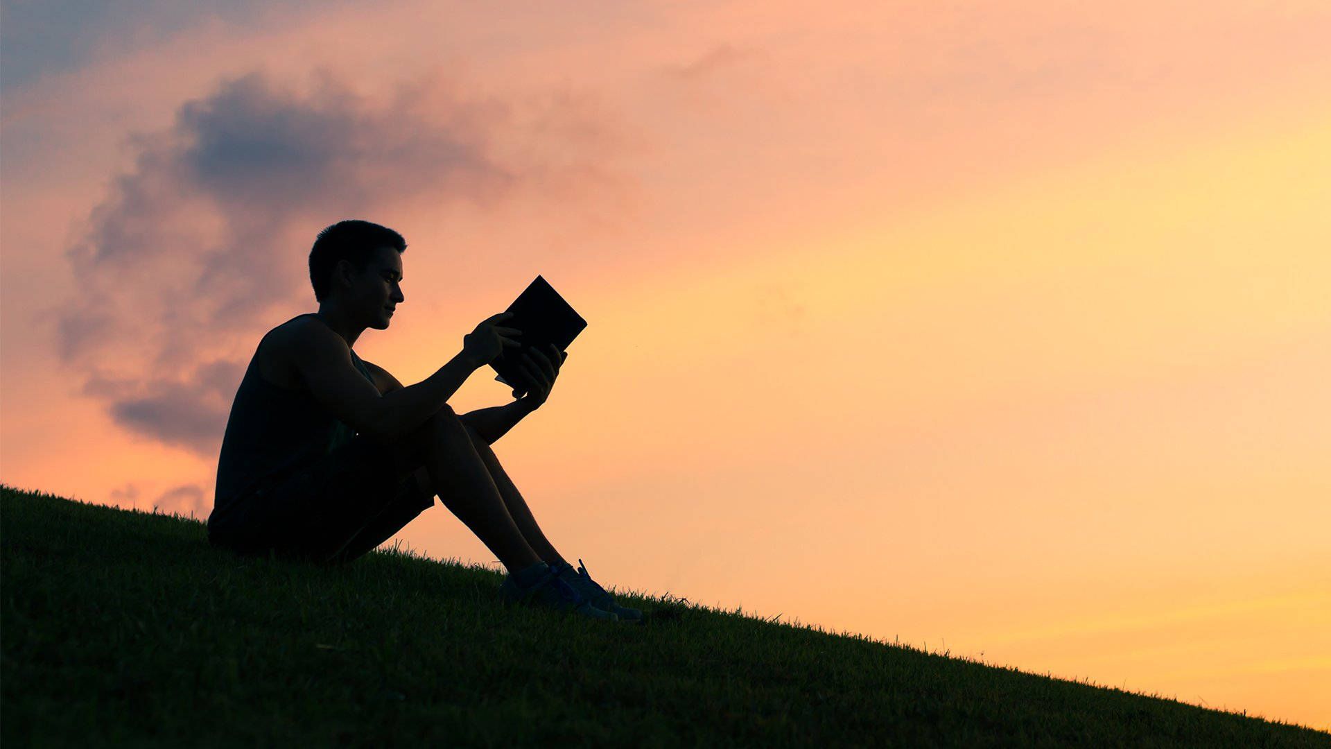 1920x1080 Alone Man Reading Book Wallpaper