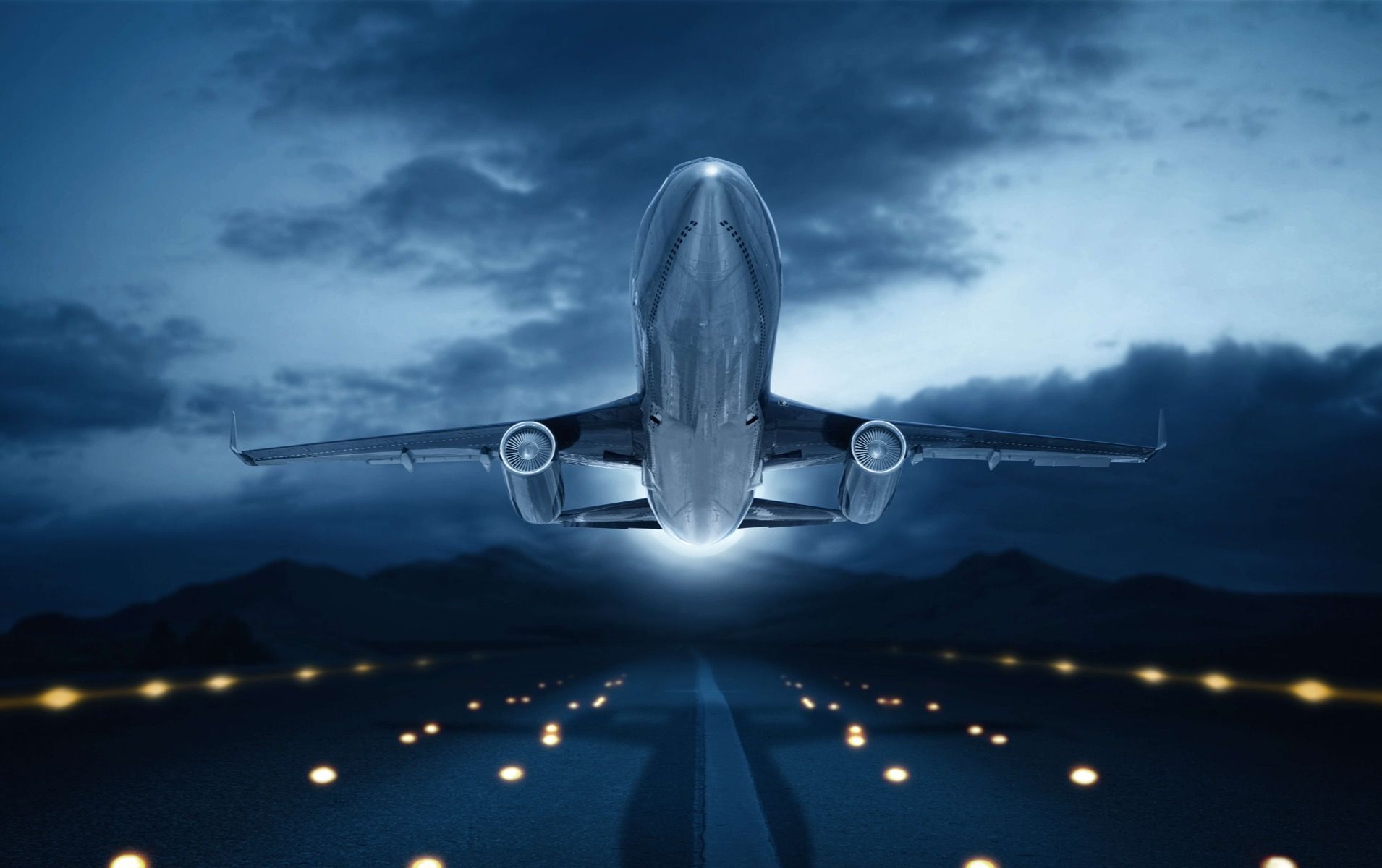1910x1200 Rising plane with dark sky