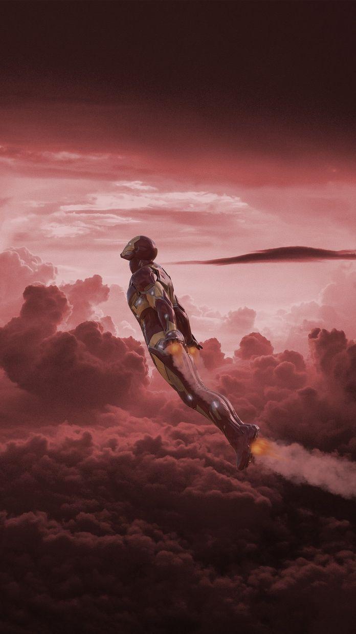 696x1238 Iron Man Fly over Titan iPhone Wallpaper. Iron man flying, Marvel wallpaper, Iron man wallpaper