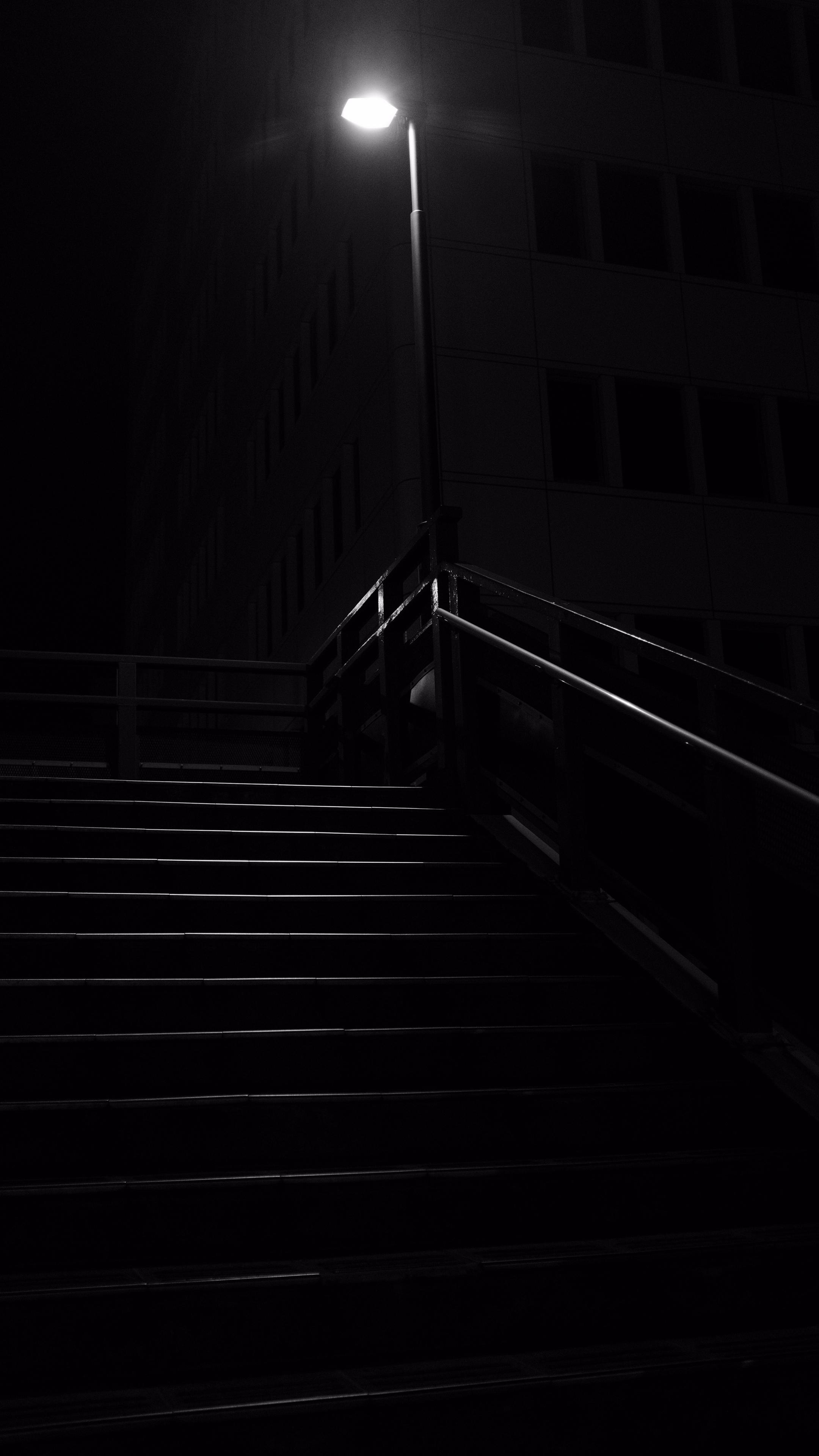 2160x3840 Download wallpaper 2160x3840 stairs, dark, lantern, night
