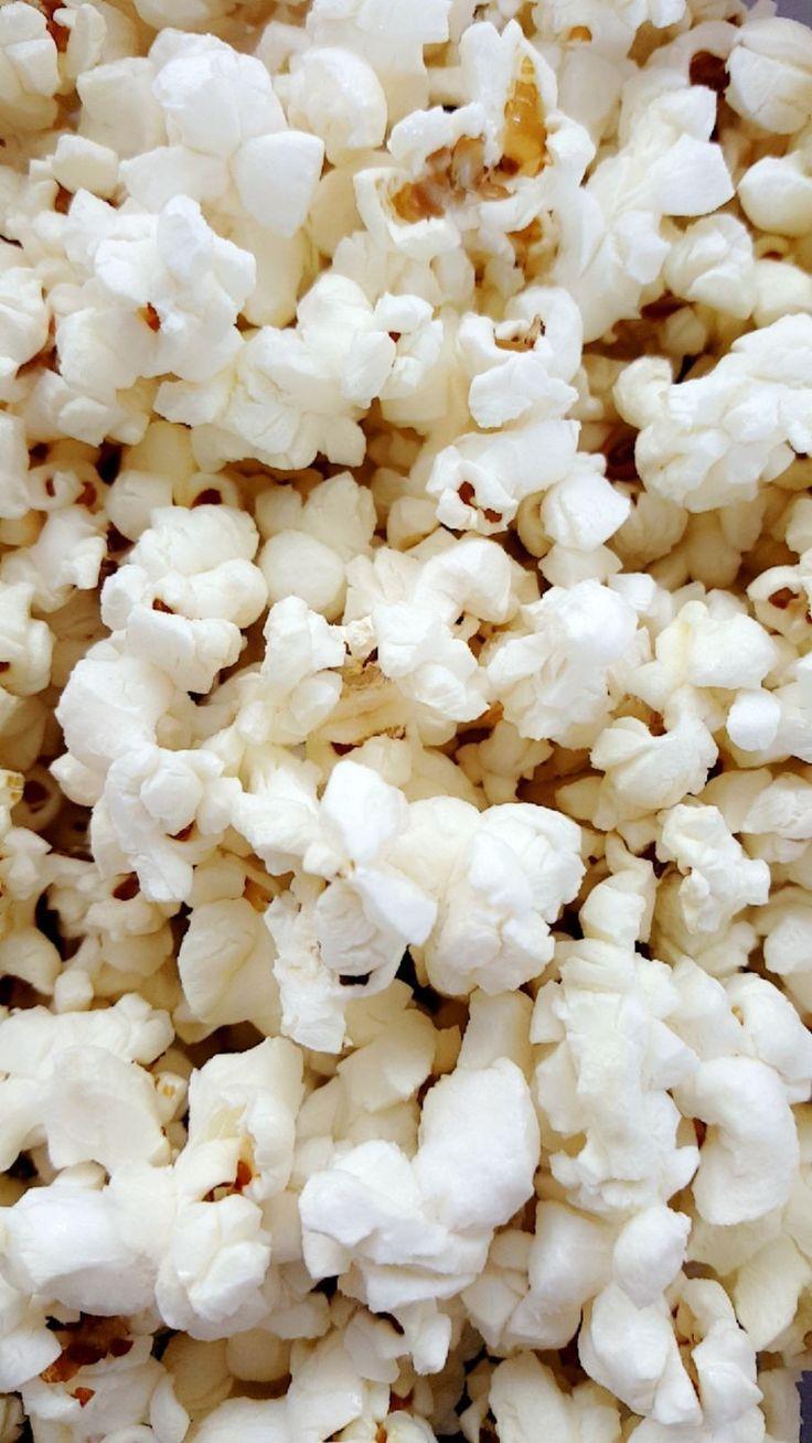 Premium Vector  Popcorn seamless pattern on a blue background popcorn  bucket boxes icon illustration