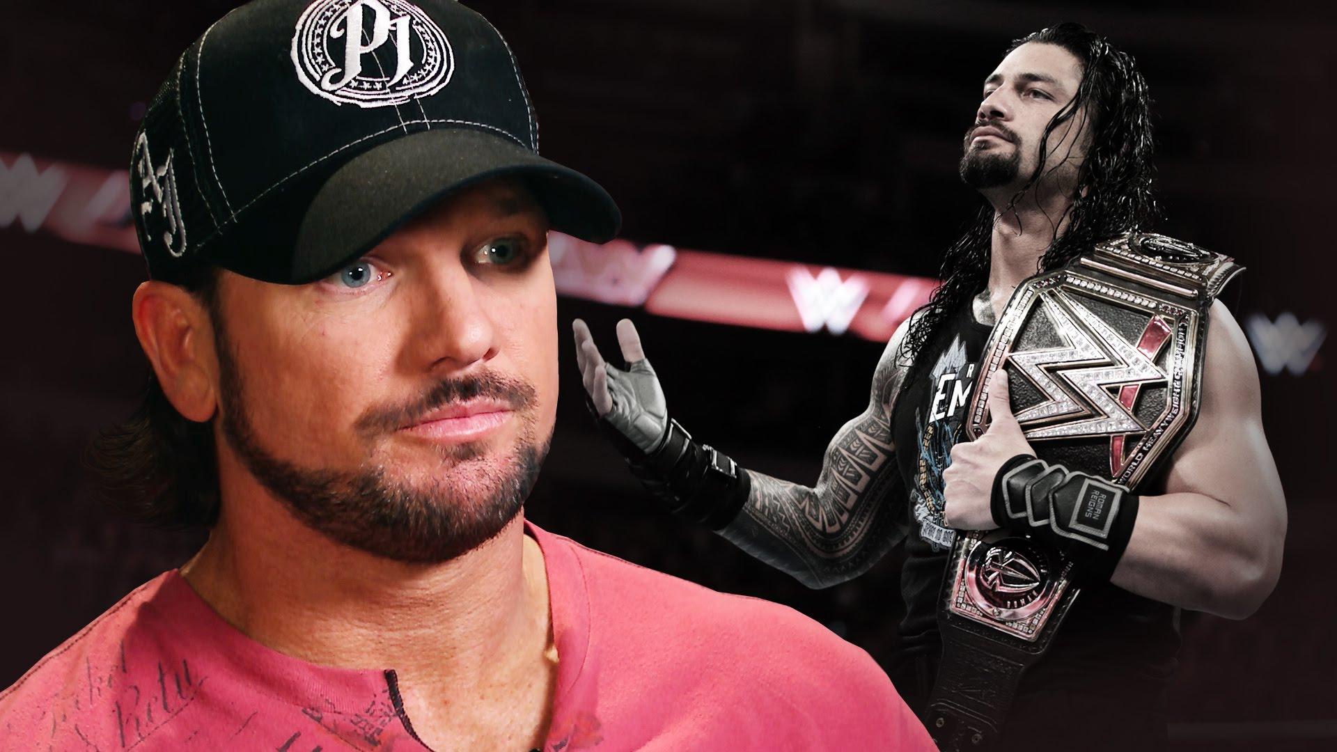 1920x1080 AJ Styles VS Roman Reigns Wallpaper HD Picture