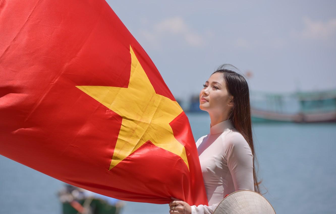 1332x850 Wallpaper girl, face, star, dress, flag, Vietnam image