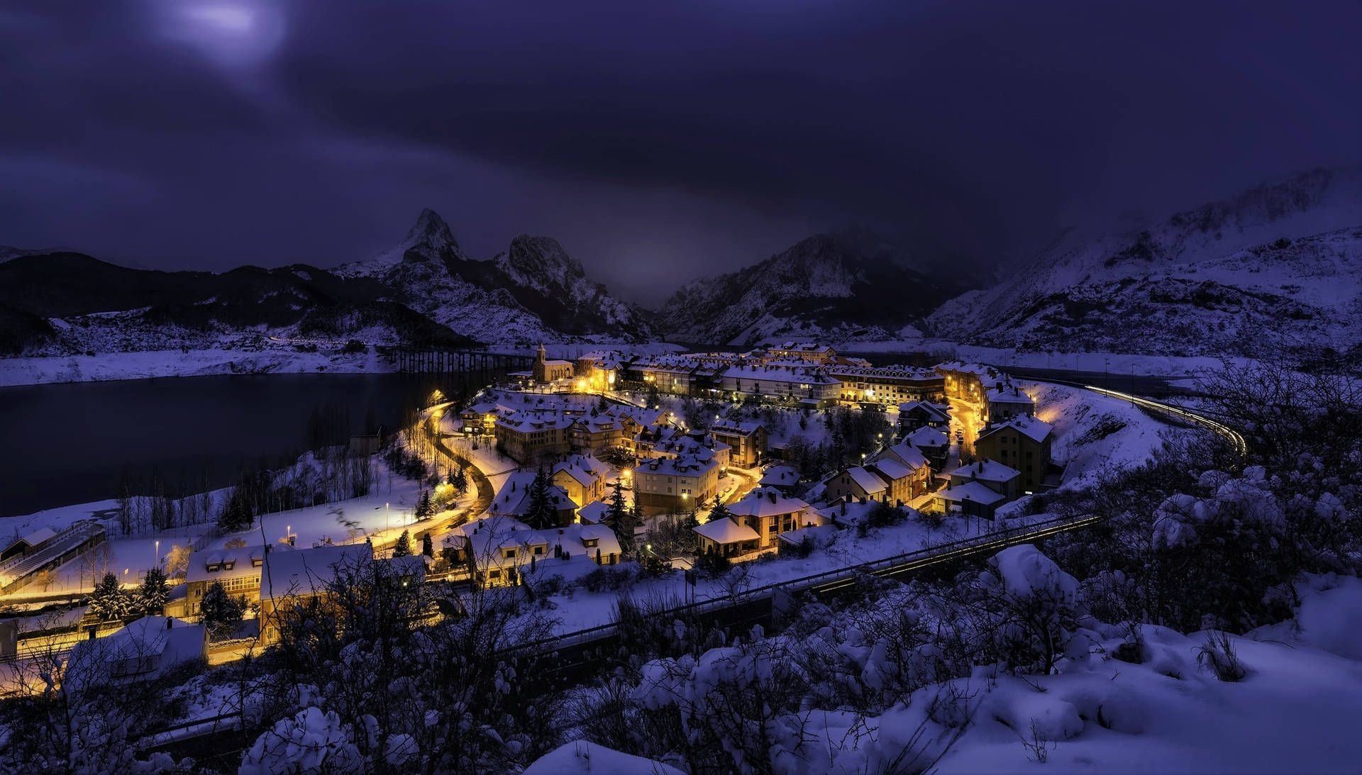 1920x1093 Snow Mountain Town At Night Wallpaper