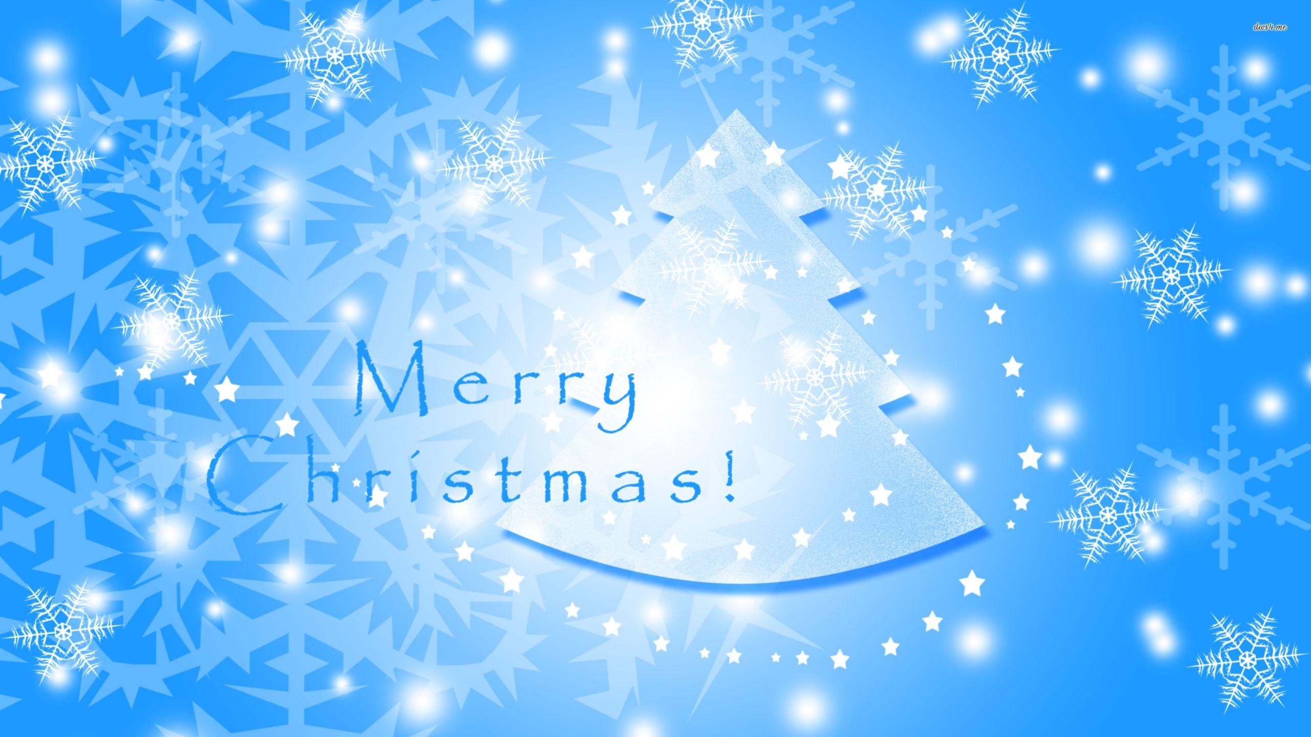 2560x1440 Christmas tree and sparkly snowflakes wallpaper
