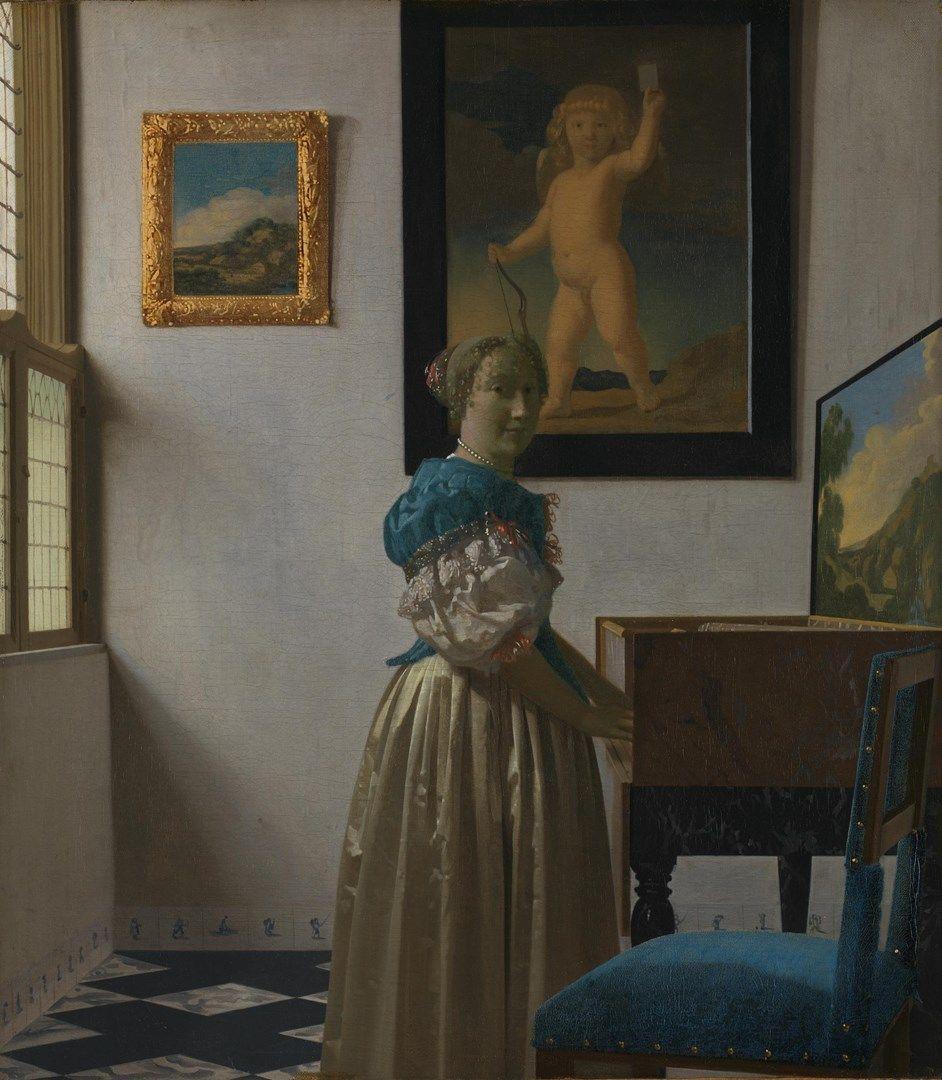 942x1080 Johannes Vermeer. A Young Woman standing at a Virginal