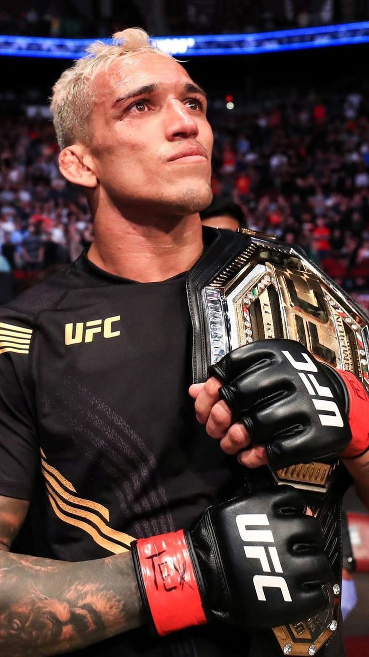 736x1308 Charles Oliveira Wallpaper