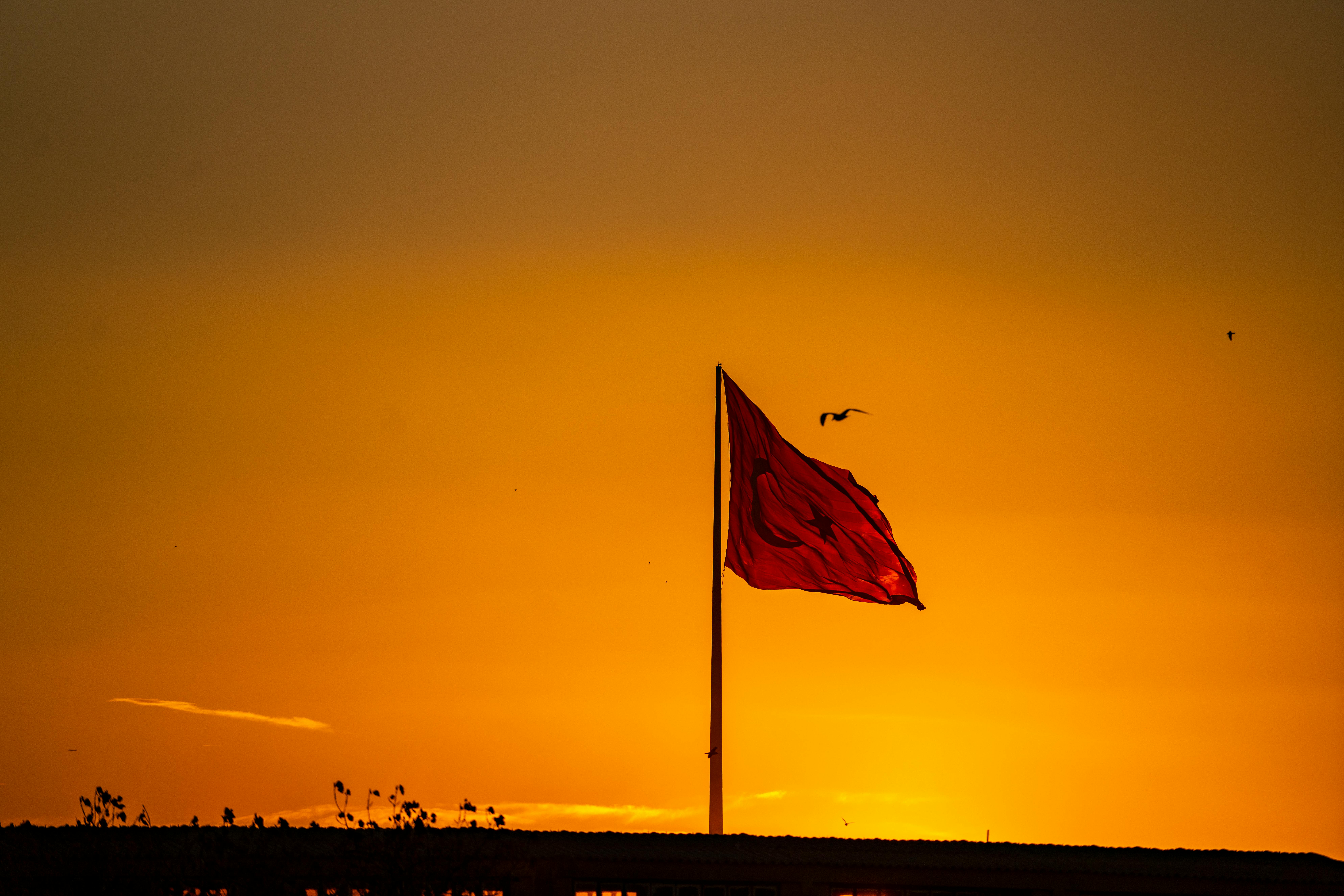 7952x5304 Flag Under the Orange Sky · Free Stock
