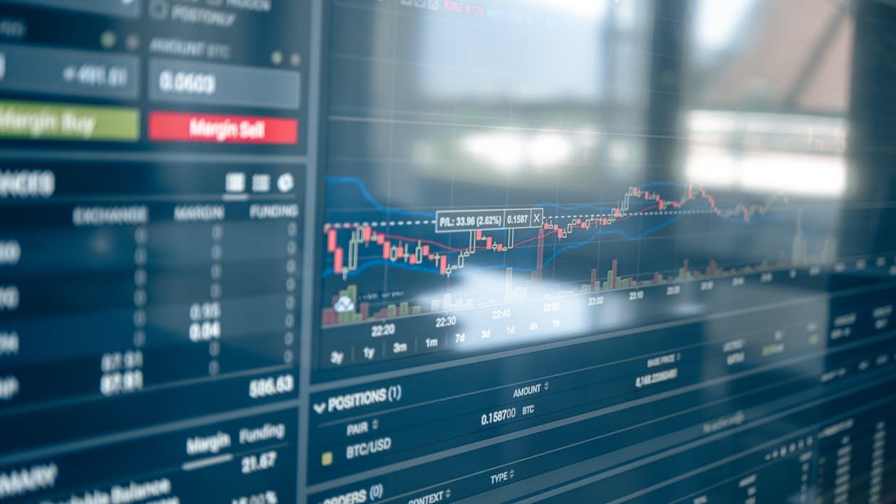 1260x709 Crypto Graph Chart on the Screen · Free