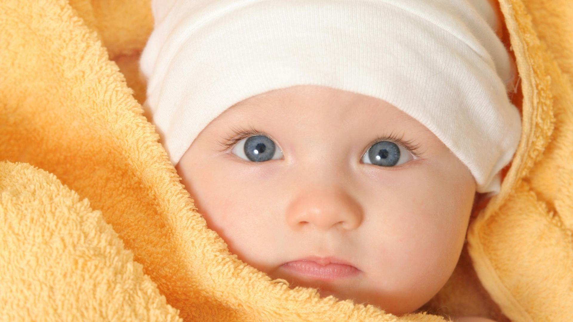 1920x1080 HD Wallpaper of Cute Baby with Blue Eye