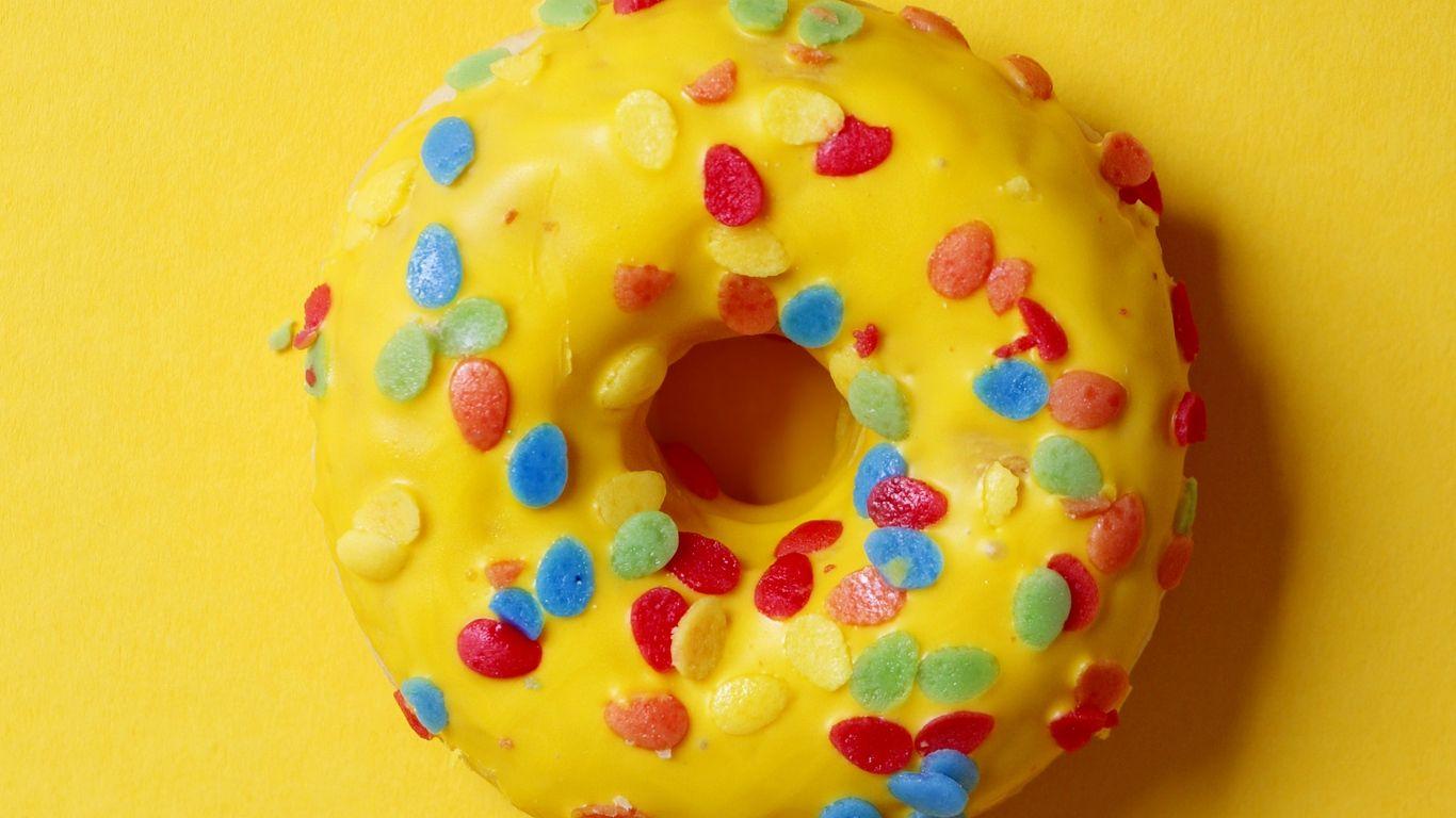 1366x768 Download wallpaper 1366x768 donut, pastry, glaze, dessert