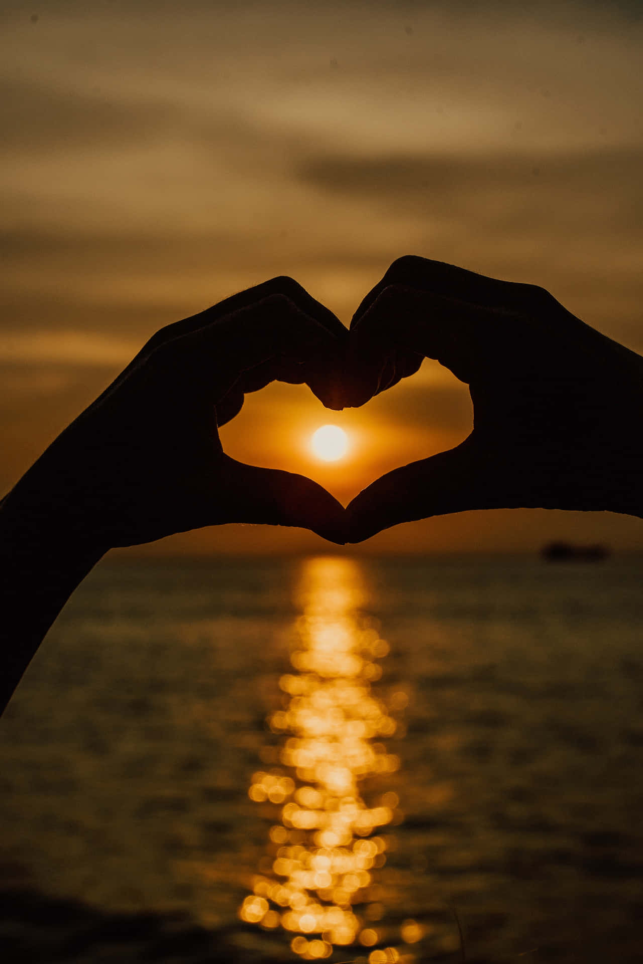 1280x1920 Heart Shape At Sunset Wallpaper