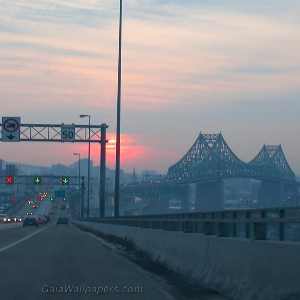 1024x1024 Driving On Pont Jacques Cartier At Sunset Wallpaper