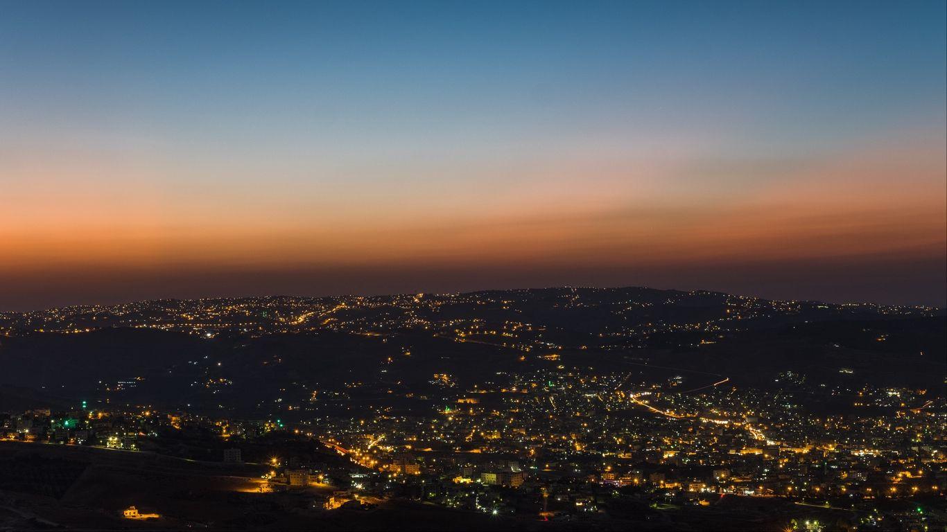 1366x768 Download wallpaper 1366x768 night city, city lights, skyline