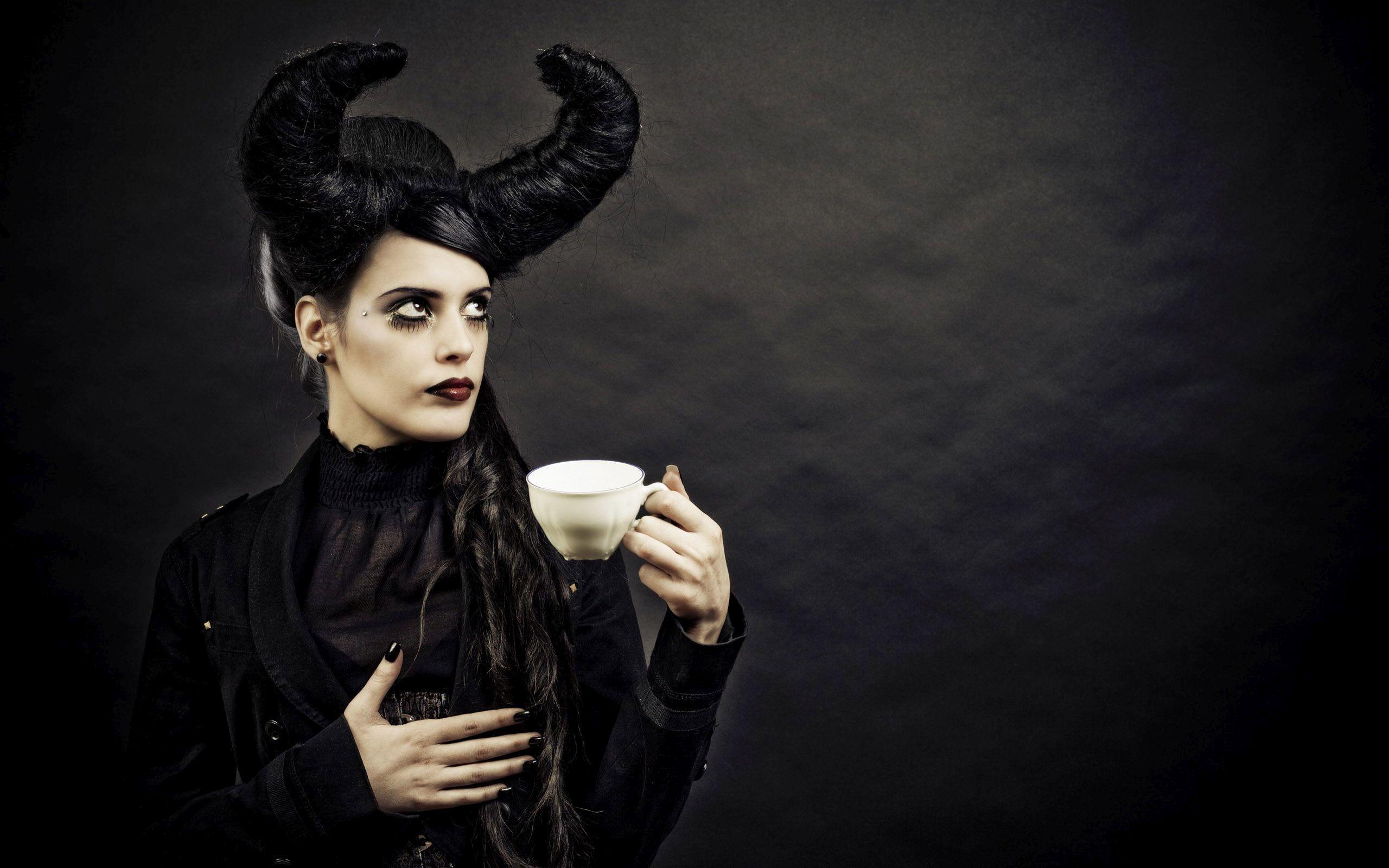 2560x1600 Woman with horns drinking coffee Wallpaper