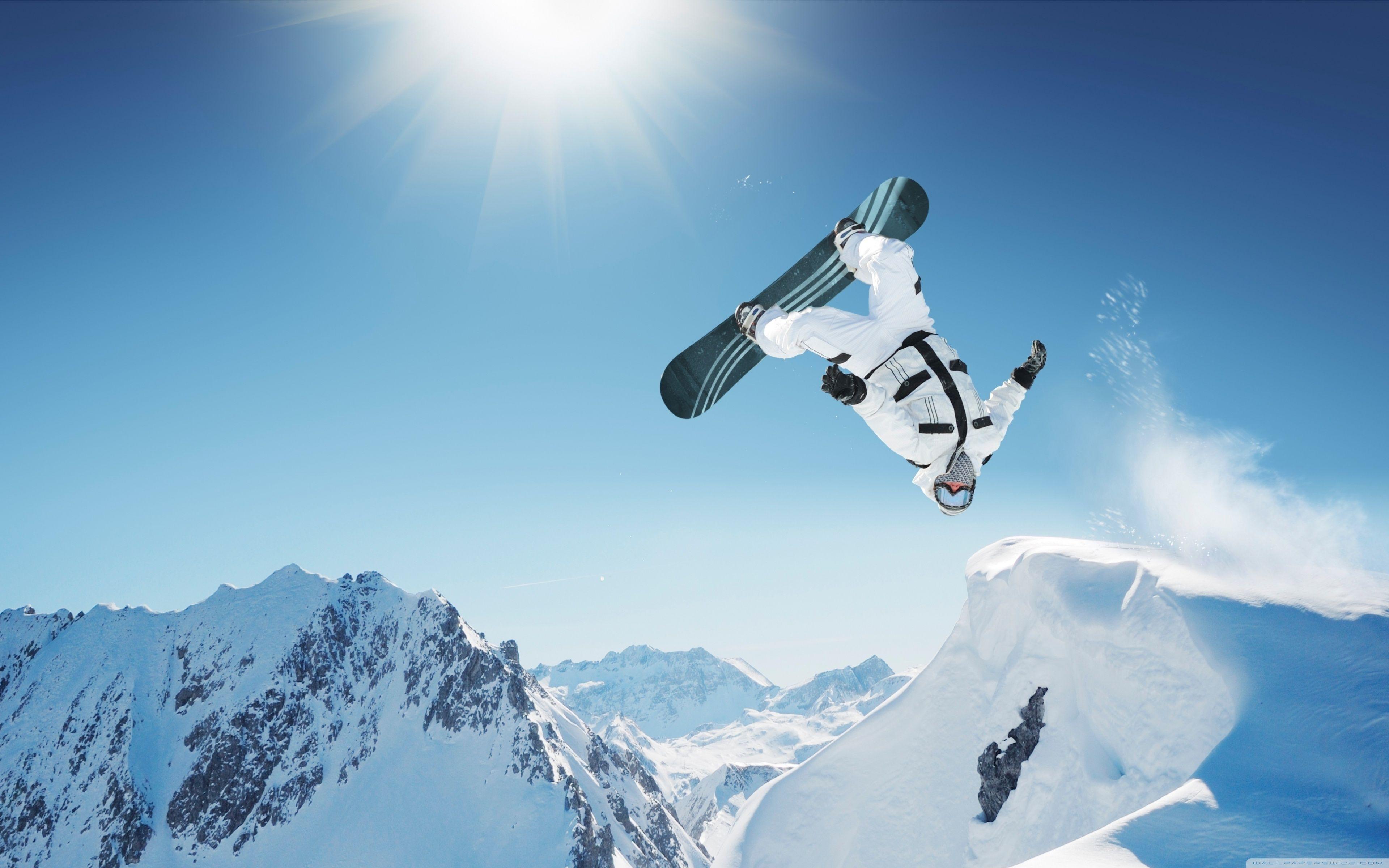 Snowboard in the snow on the mountain Hd wallpaper