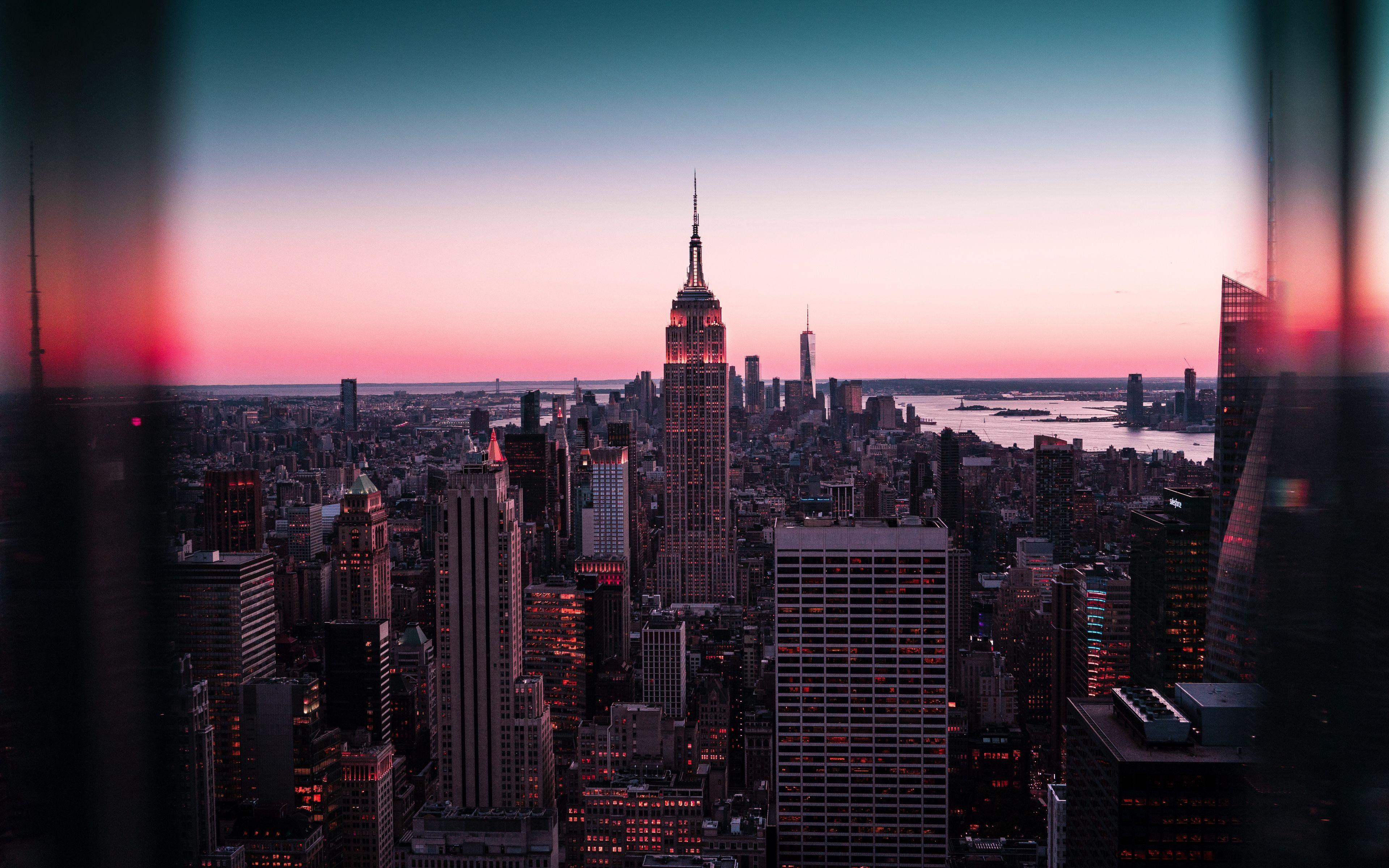 3840x2400 Download wallpaper 3840x2400 skyscrapers, sunset