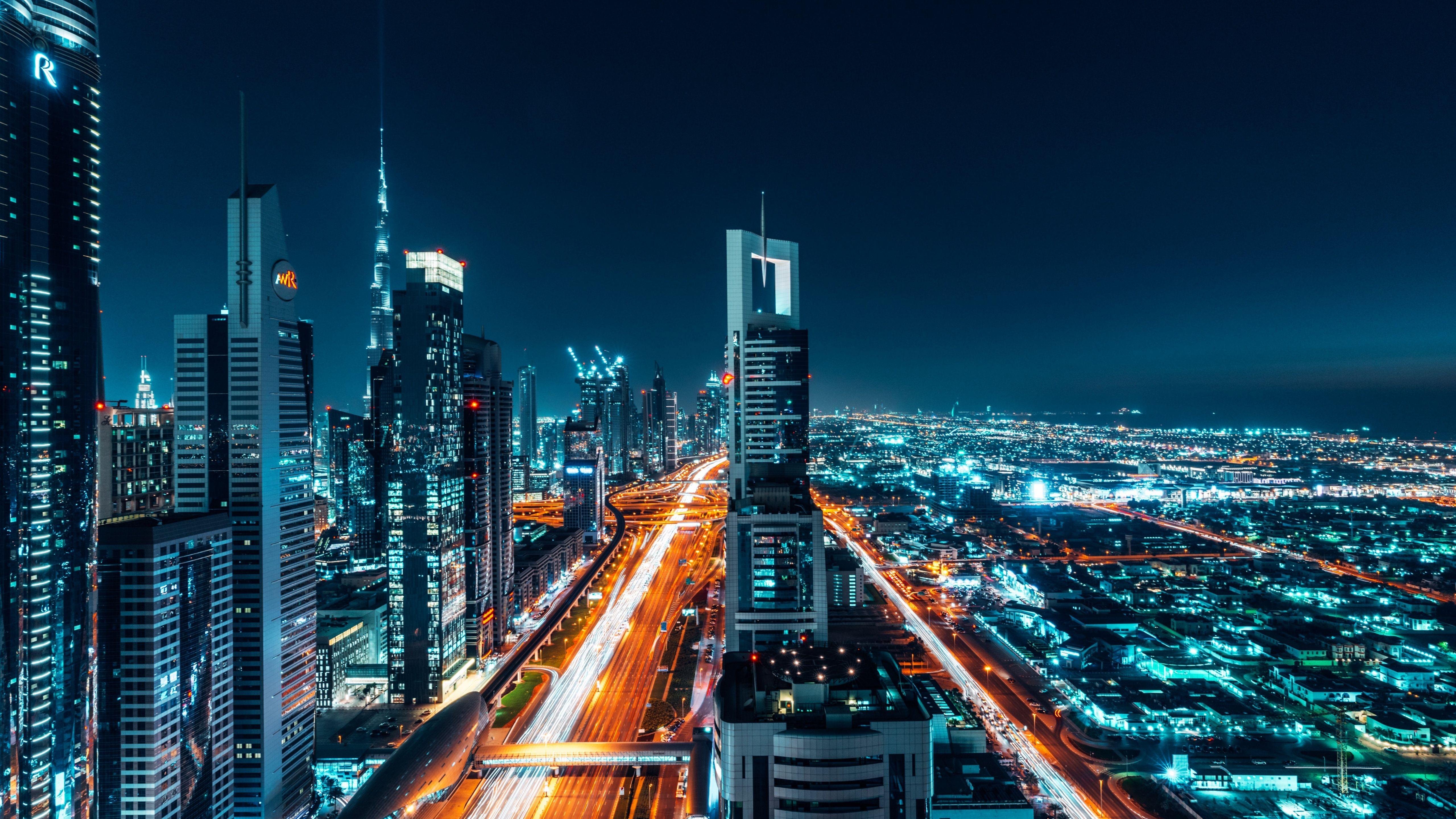 5120x2880 Download 5120x2880 wallpaper dubai, city, buildings, cityscape, night, 5k image, background, 5105