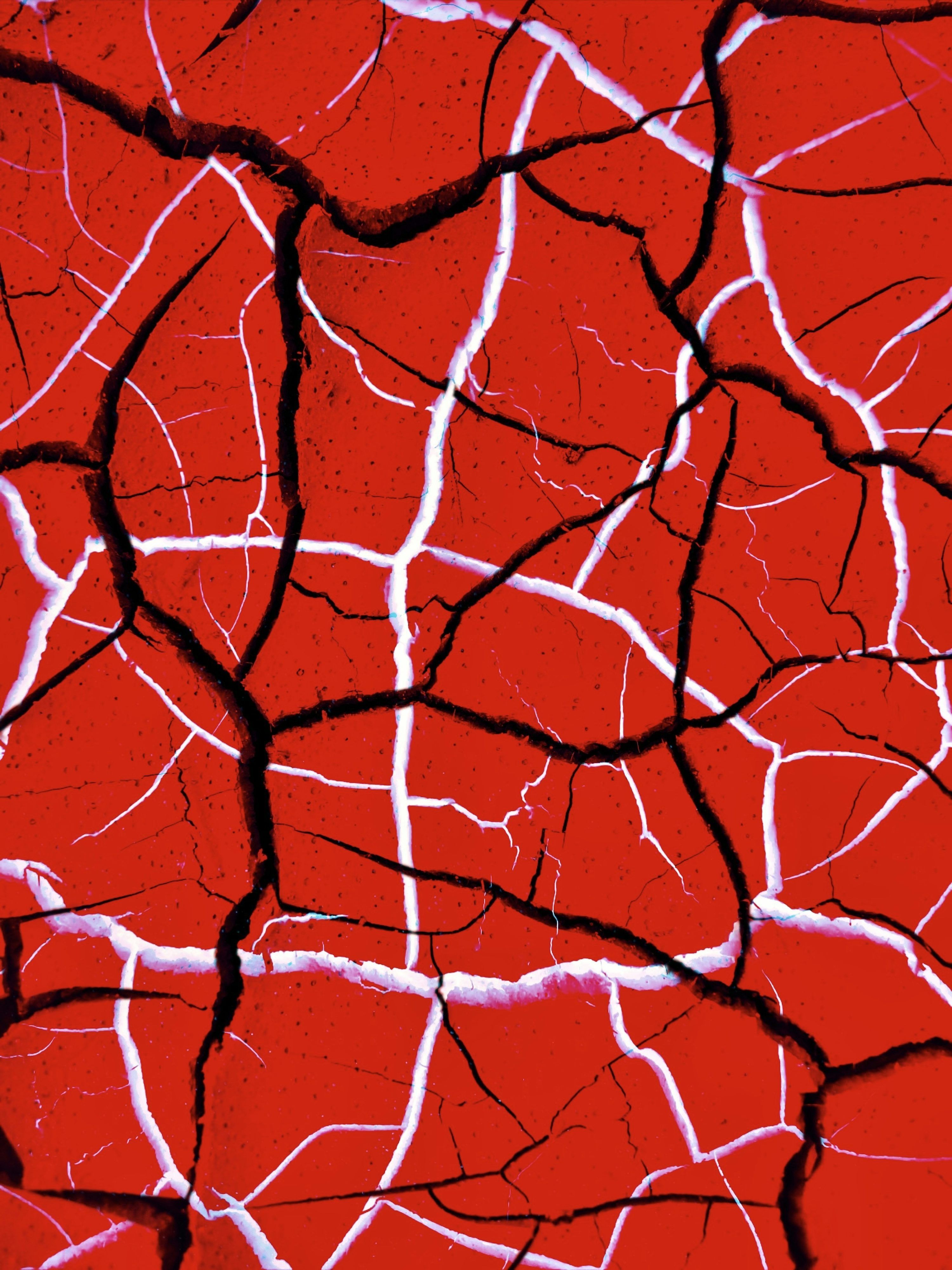 3000x4000 A close up of a red surface with cracks