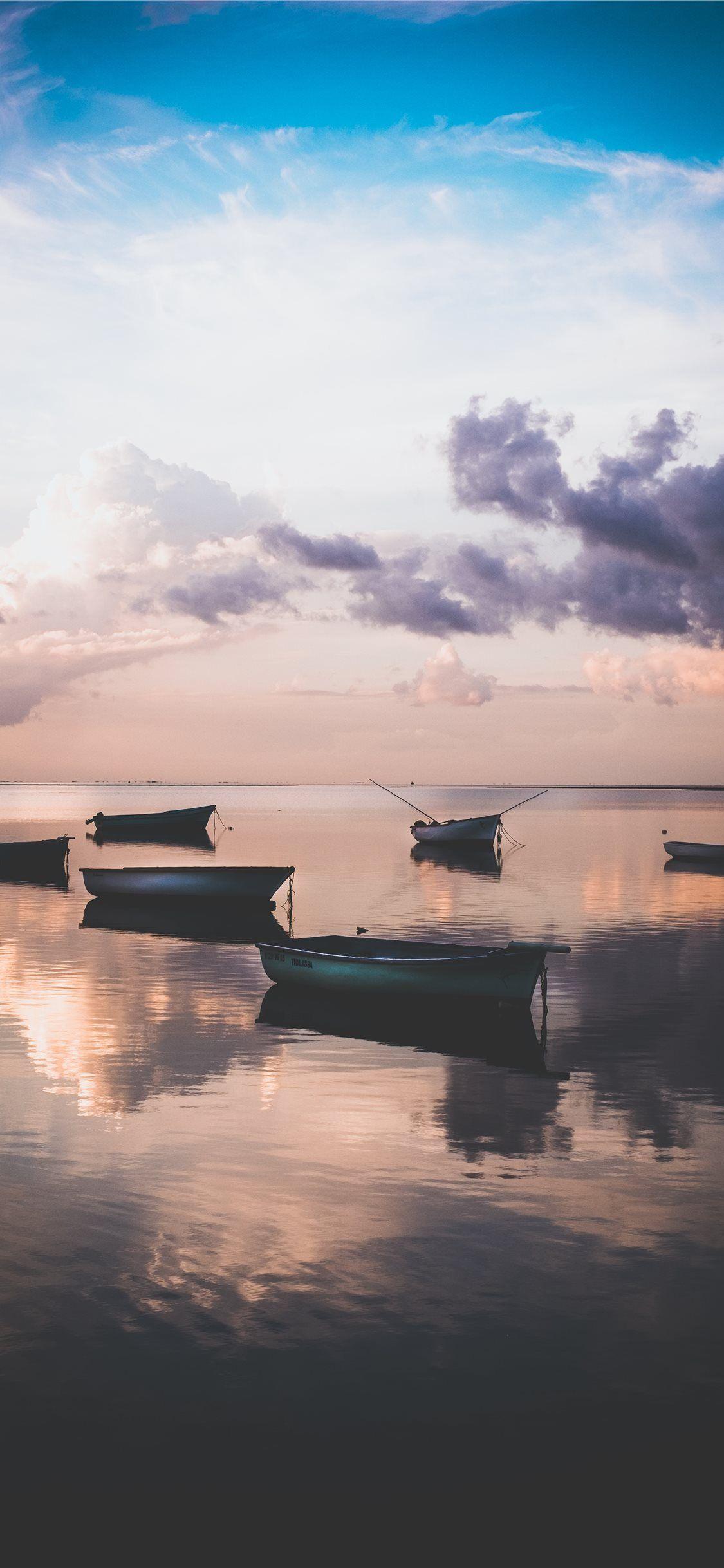 1125x2436 Sunset in Mauritius whilst the tide rolls in iPhone X