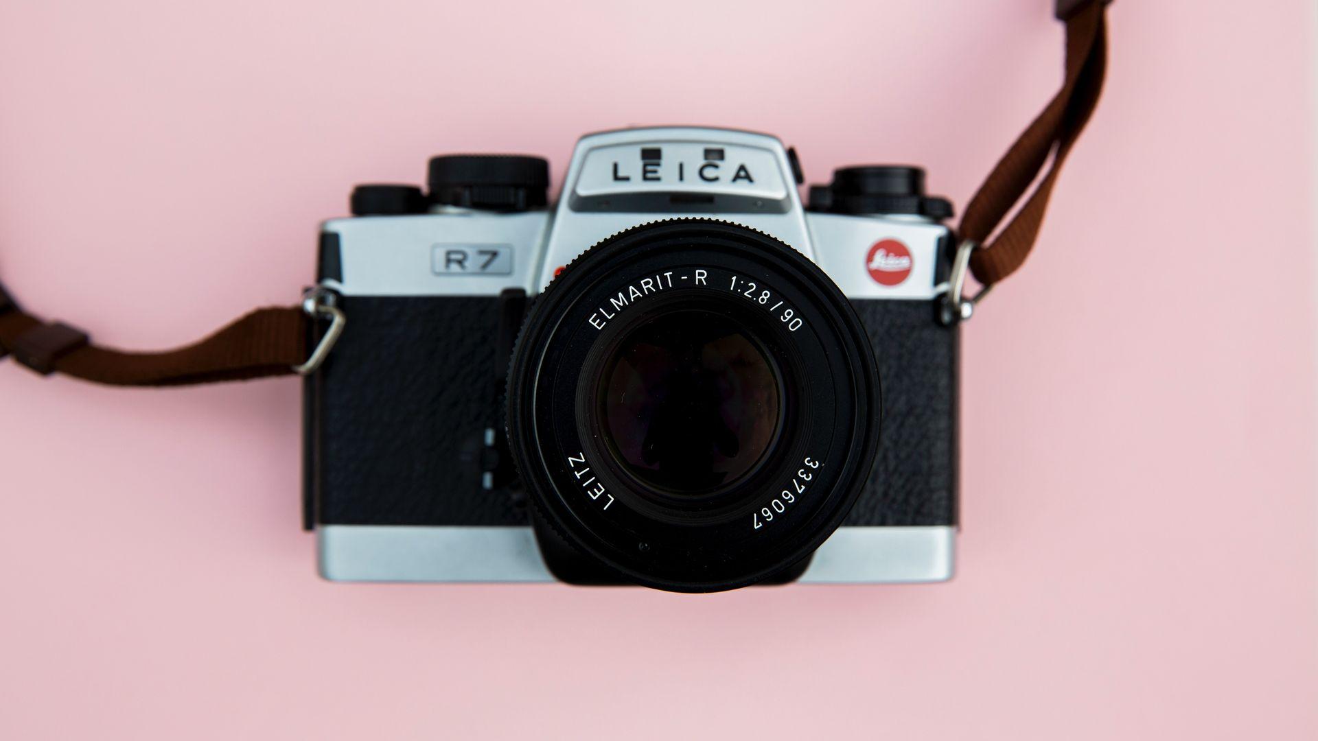 1920x1080 Leica Camera on Pink Background Wallpaper