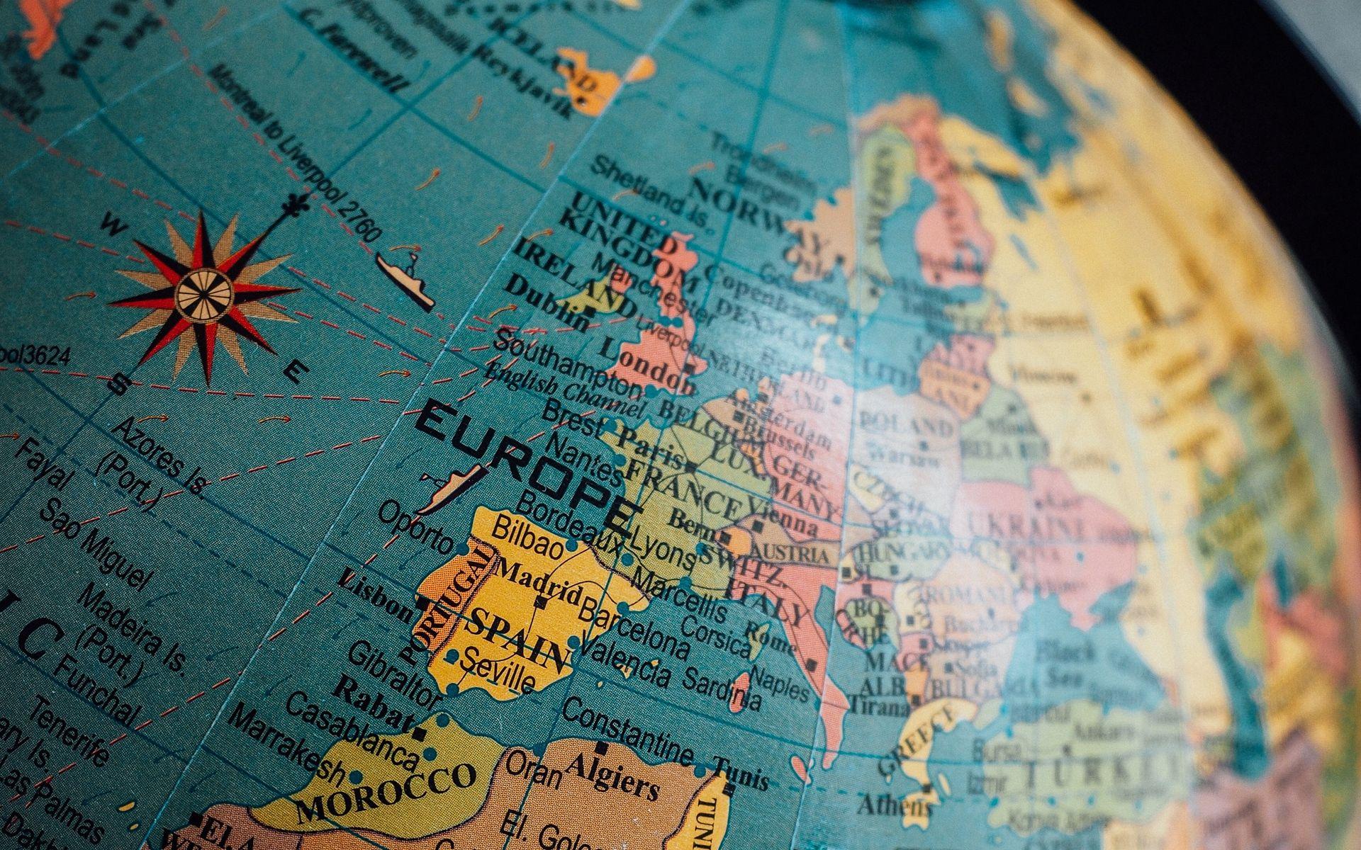 1920x1200 Download wallpaper 1920x1200 globe, map, travel, blur
