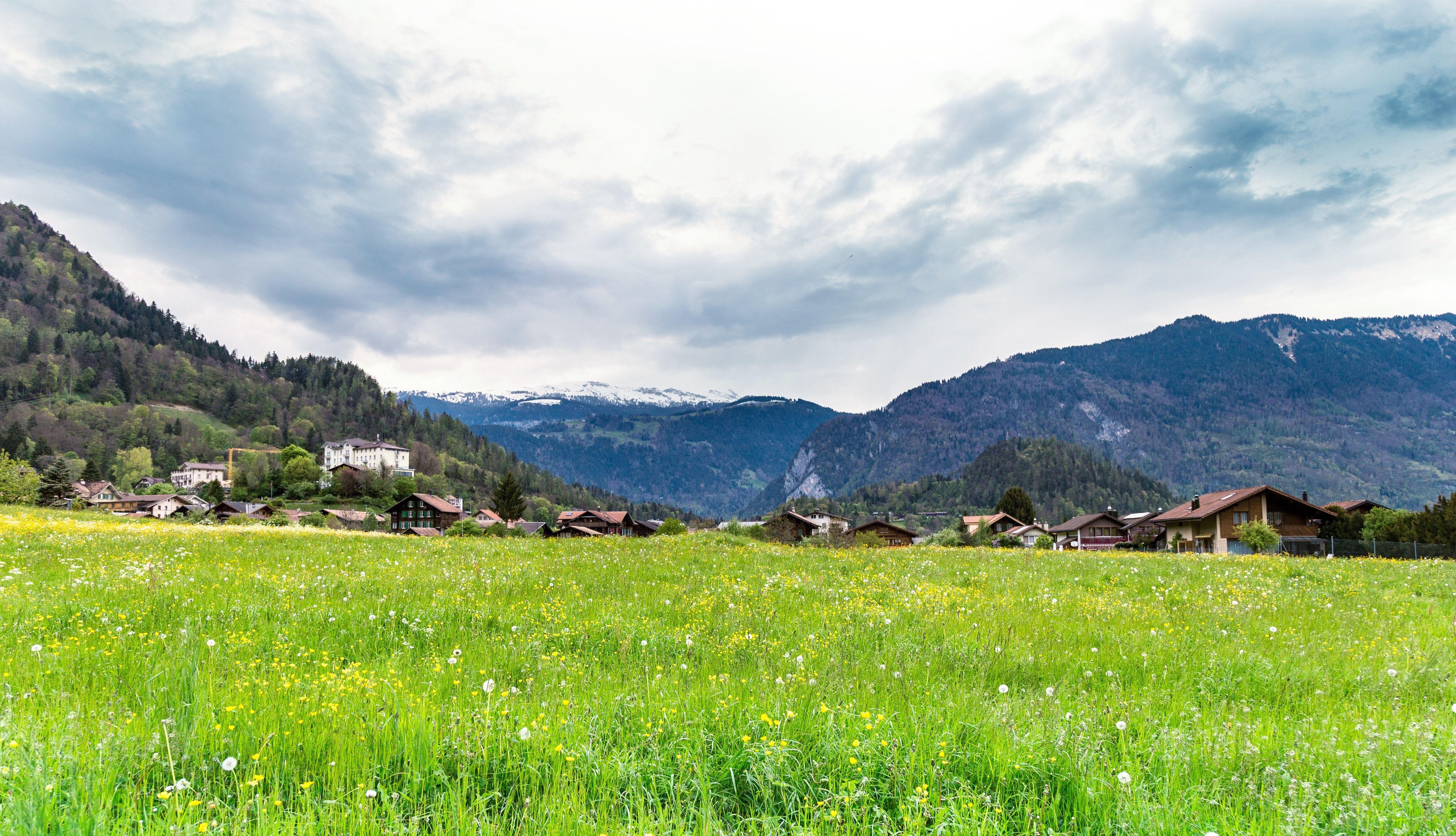 5472x3142 Free photo: Green Grass Field and Mountain Under White Clouds