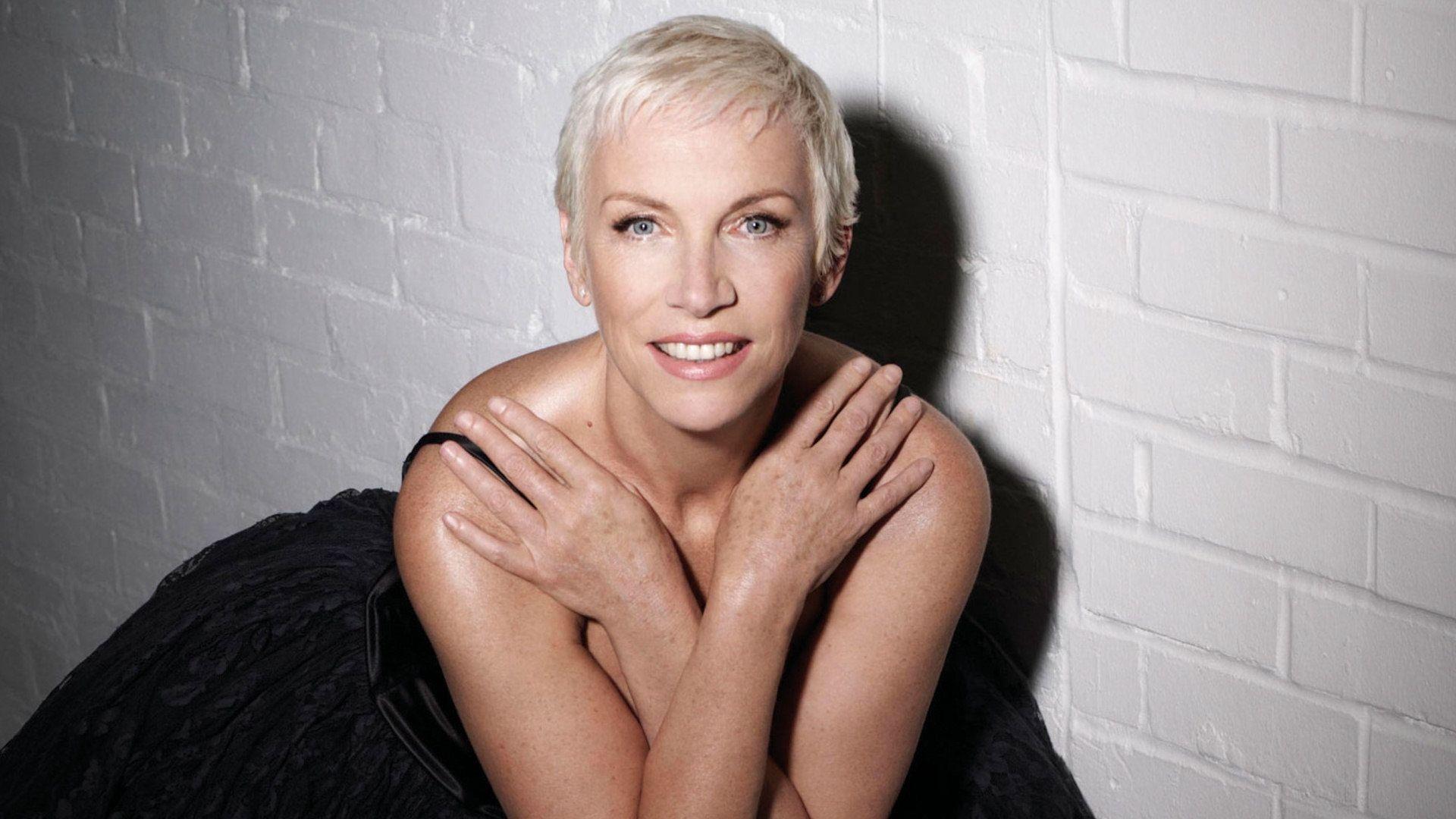1920x1080 Download wallpaper 1920x1080 annie lennox, smile, hands