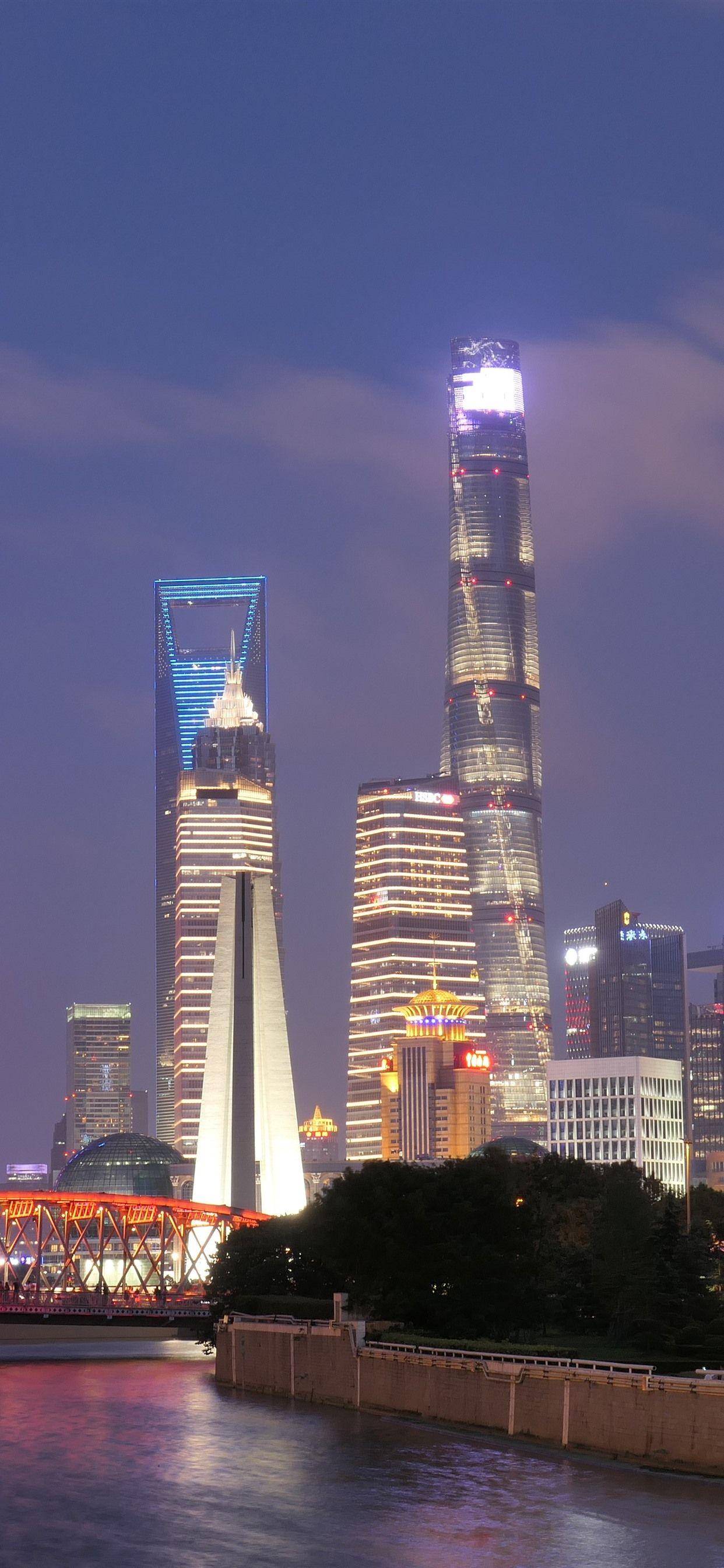 1242x2688 Shanghai at night, cityscape, skyscrapers, lights, river