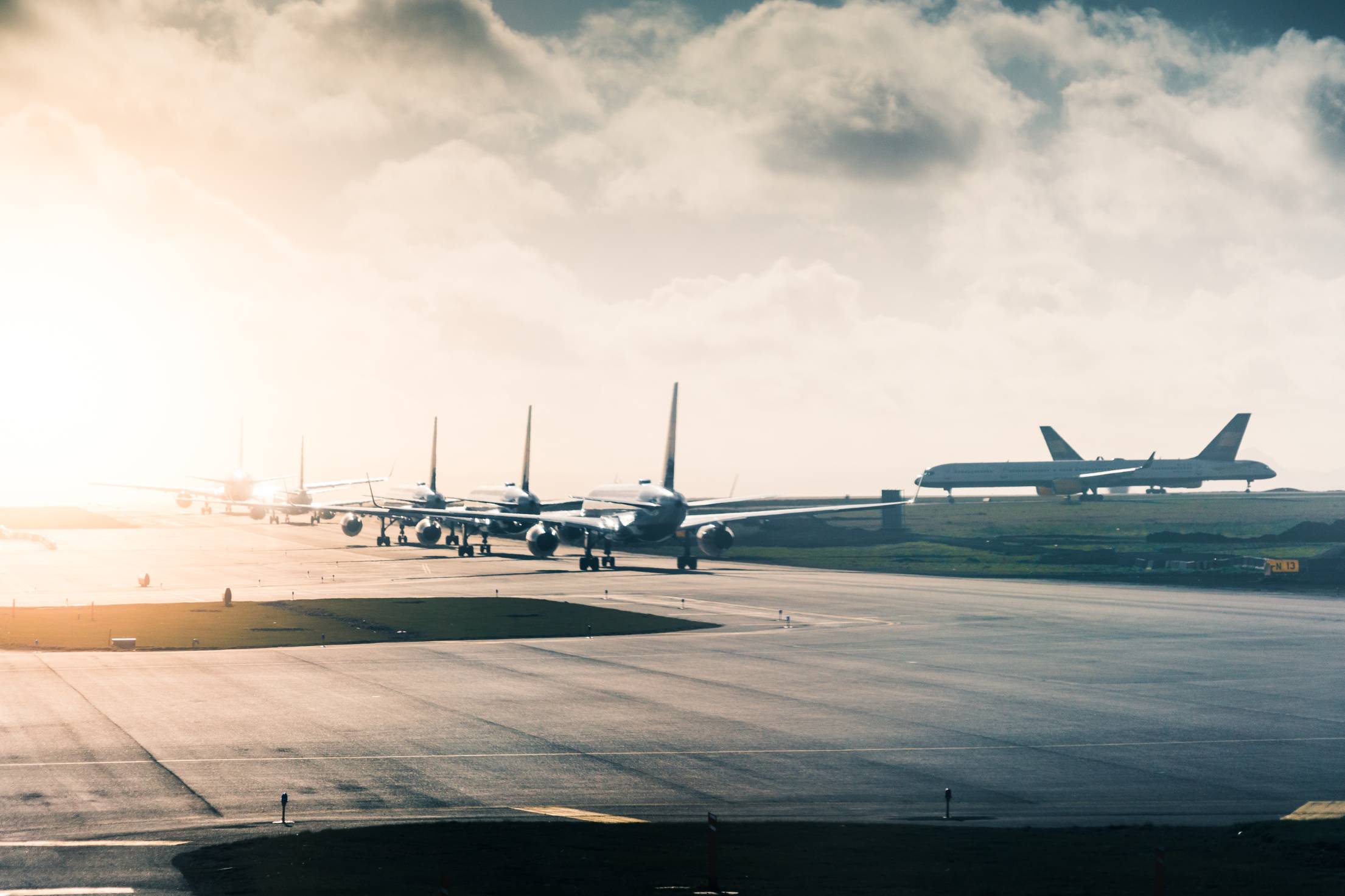 2210x1473 Airport Taxiway Long Queue of Planes