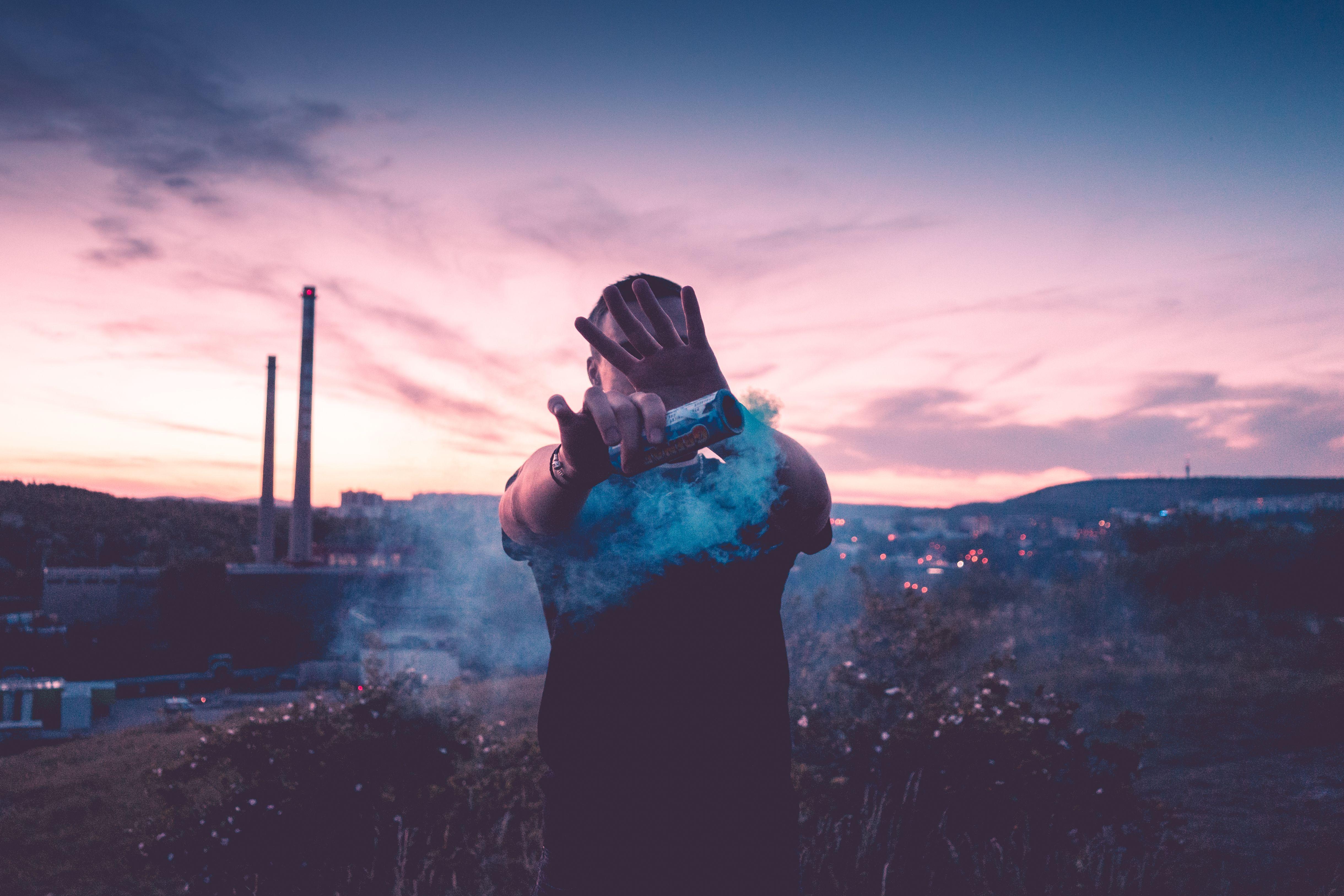 4879x3253 Young Man With Smoke Grenade Free