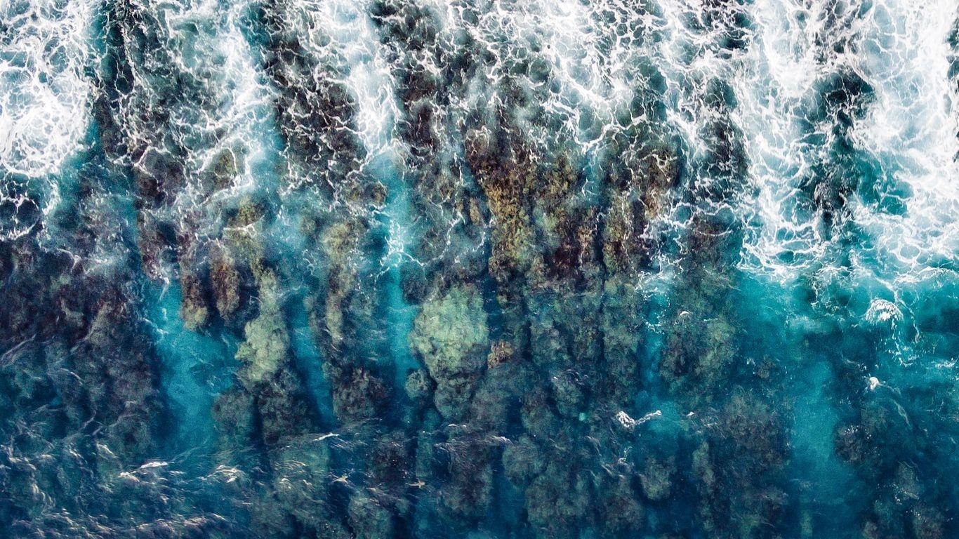 1366x768 Download wallpaper 1366x768 water, ocean, surf, aerial view