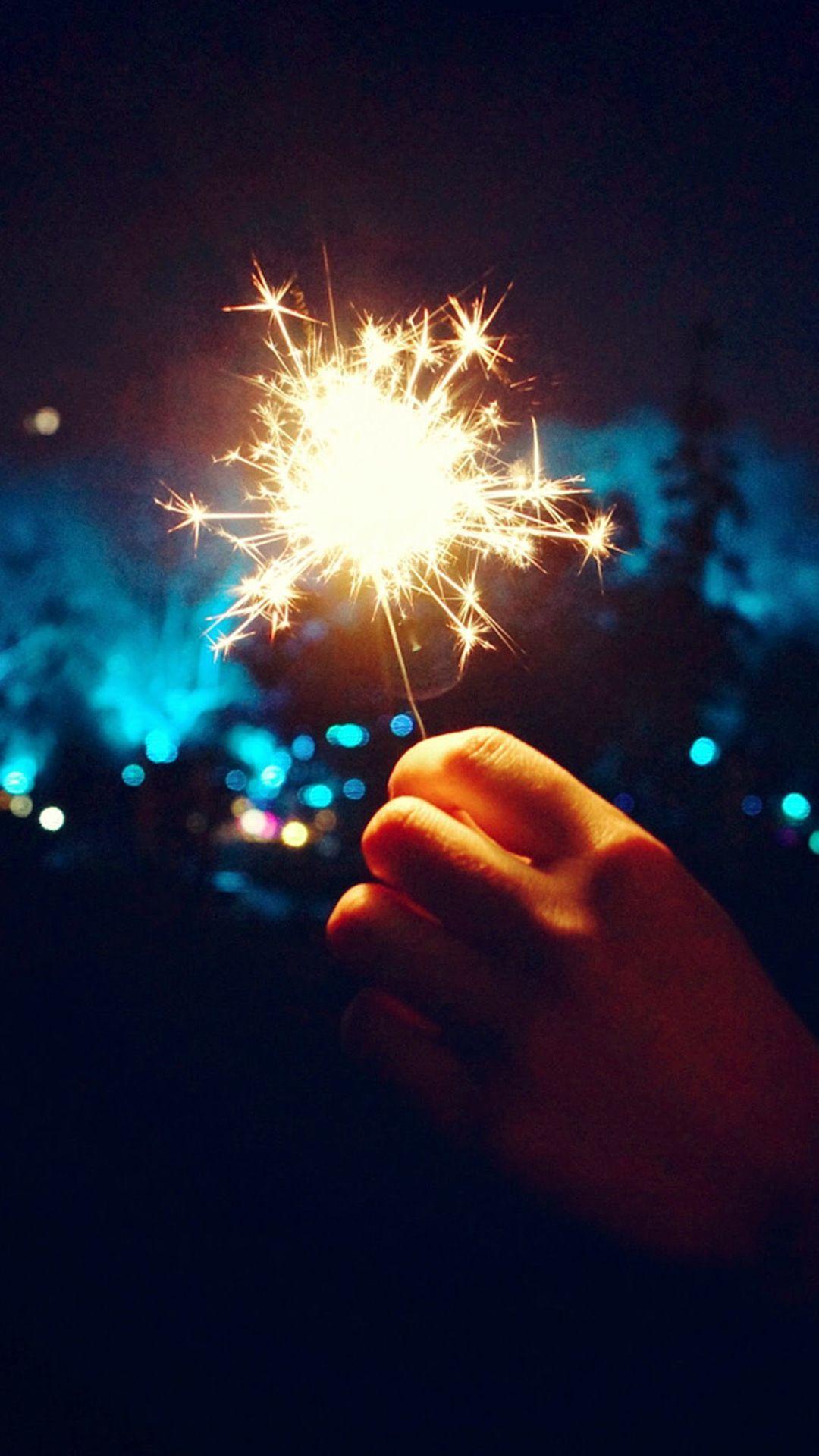 1080x1920 Happy New Year Fireworks Hand #iPhone #plus #wallpaper. Fireworks wallpaper iphone, Happy new year wallpaper, iPhone wallpaper vintage