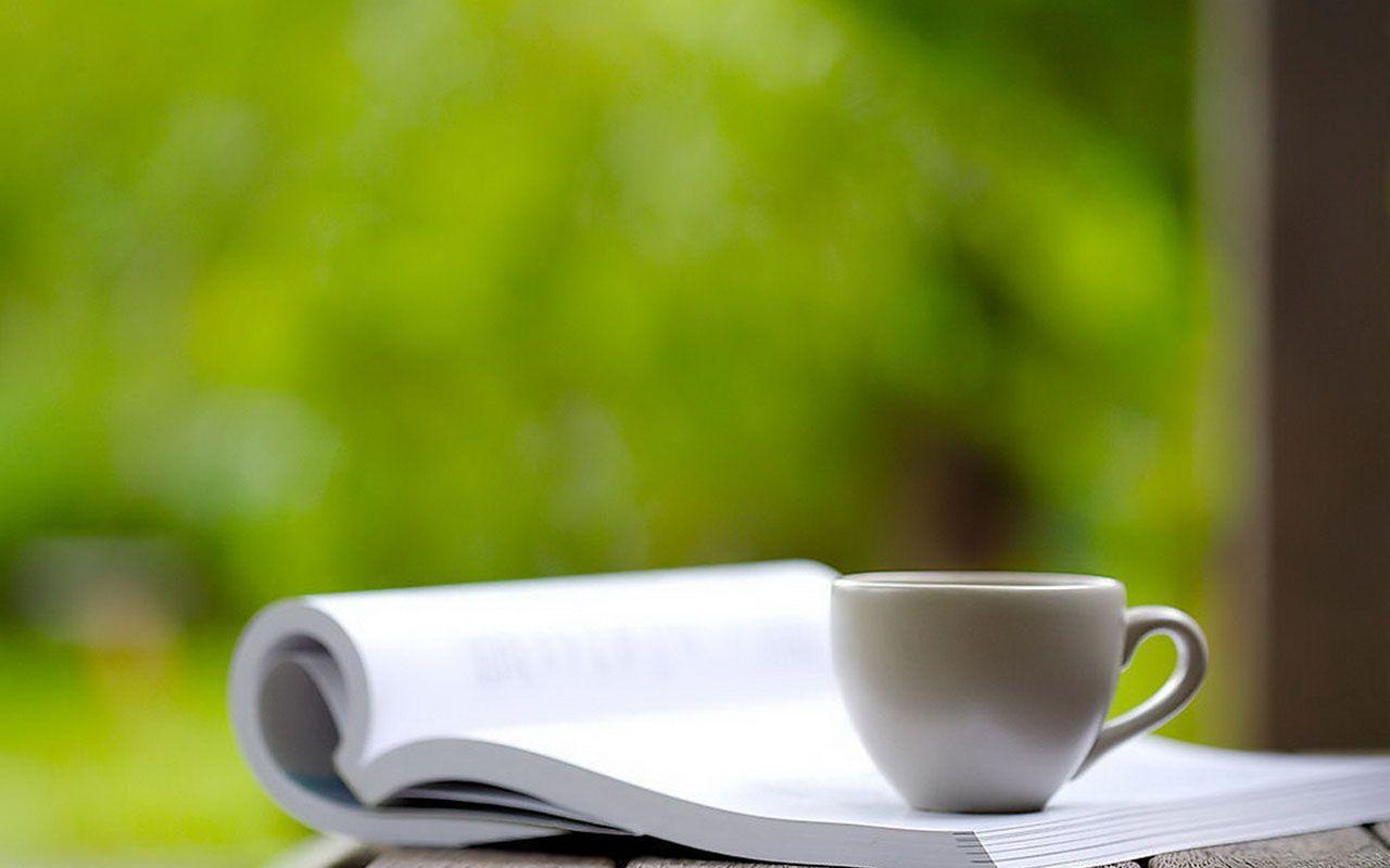1280x800 Books On A White Coffee Cup Wallpaper