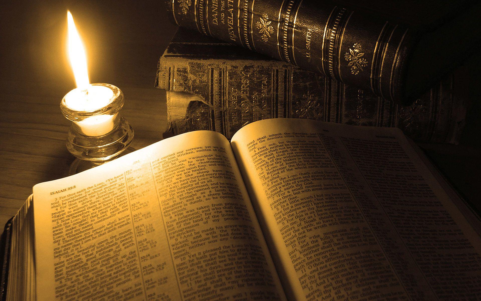 1920x1200 Reading at the candle light Wallpaper