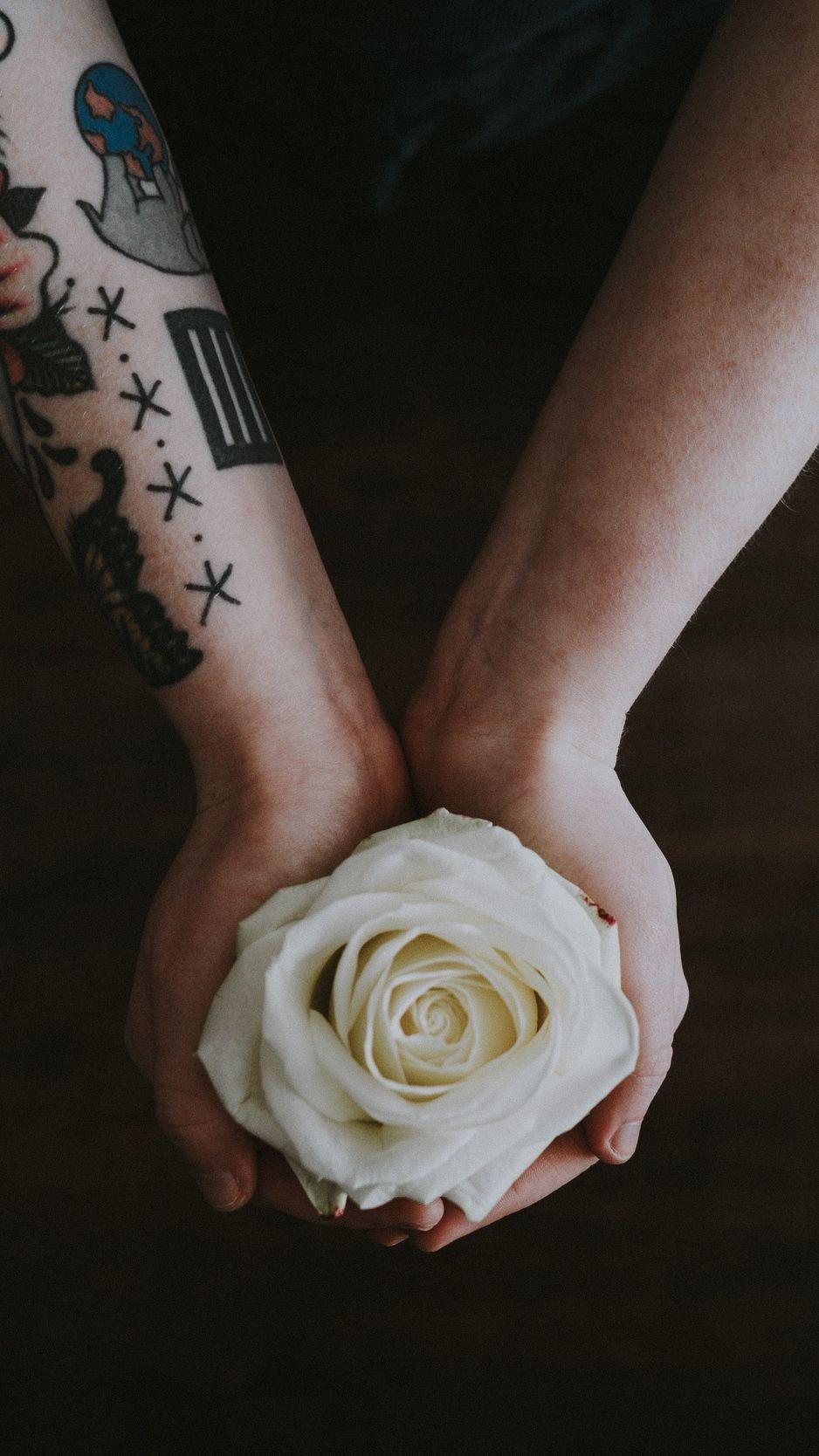 938x1668 Download wallpaper 938x1668 rose, hands, tattoo, flower, bud