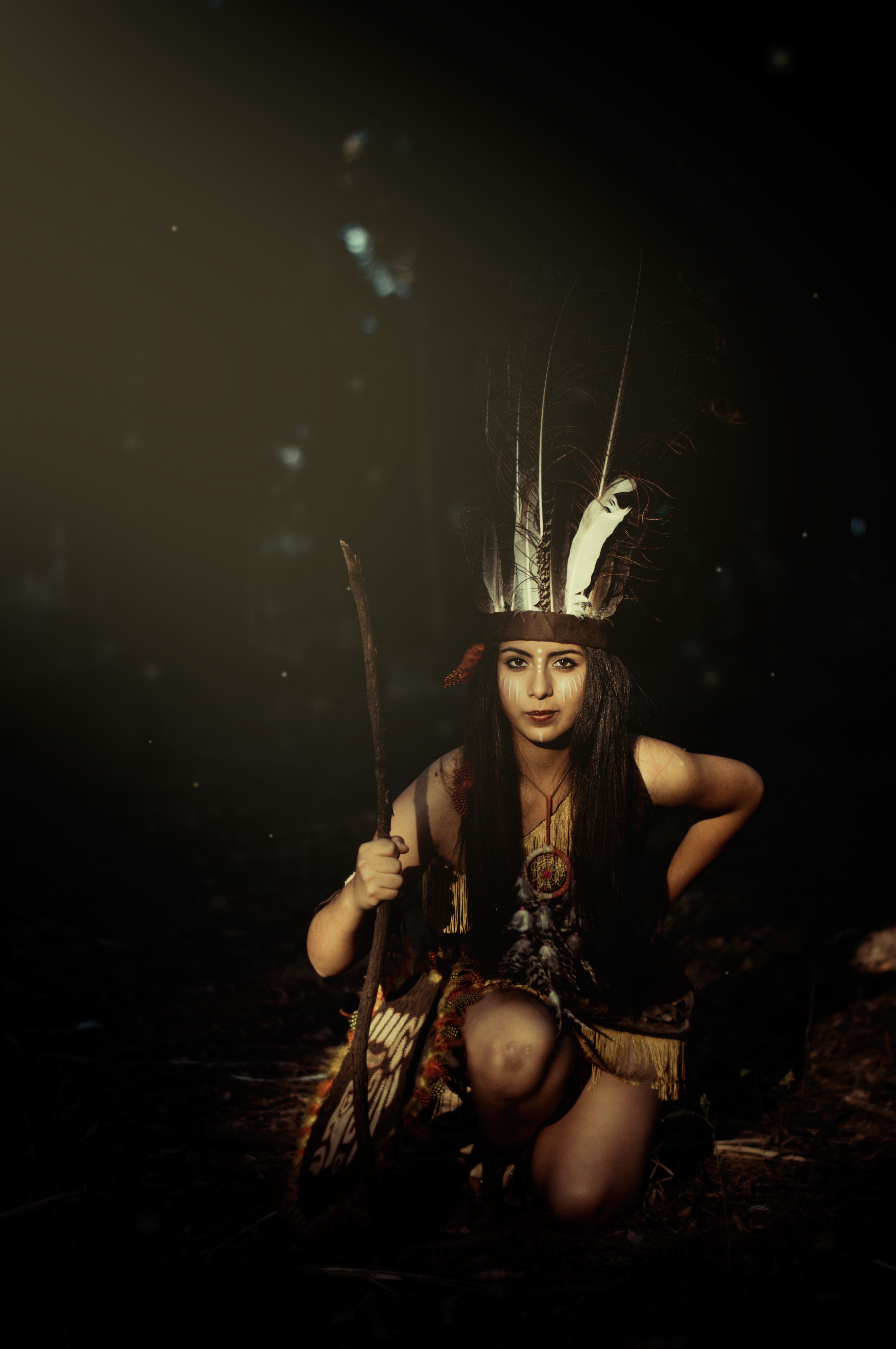 4000x6016 one knee holding twig rod free image
