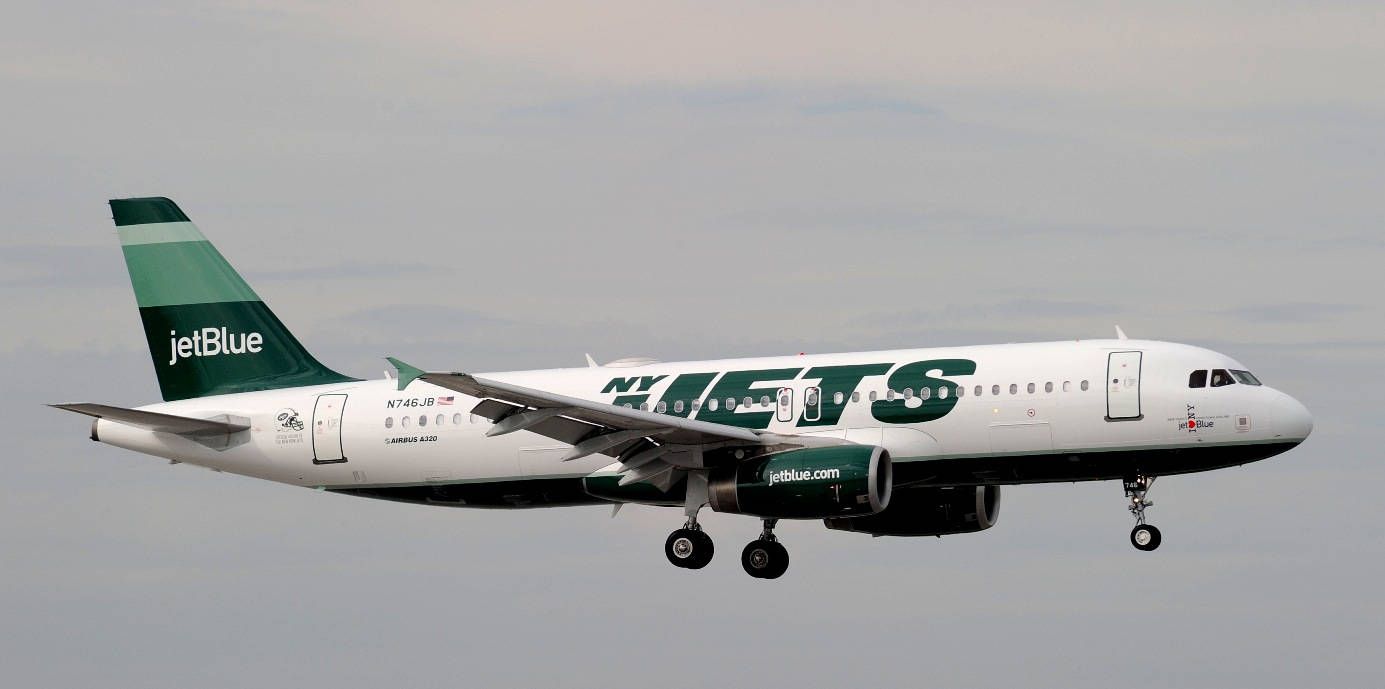 1385x689 Green Plane Wallpaper