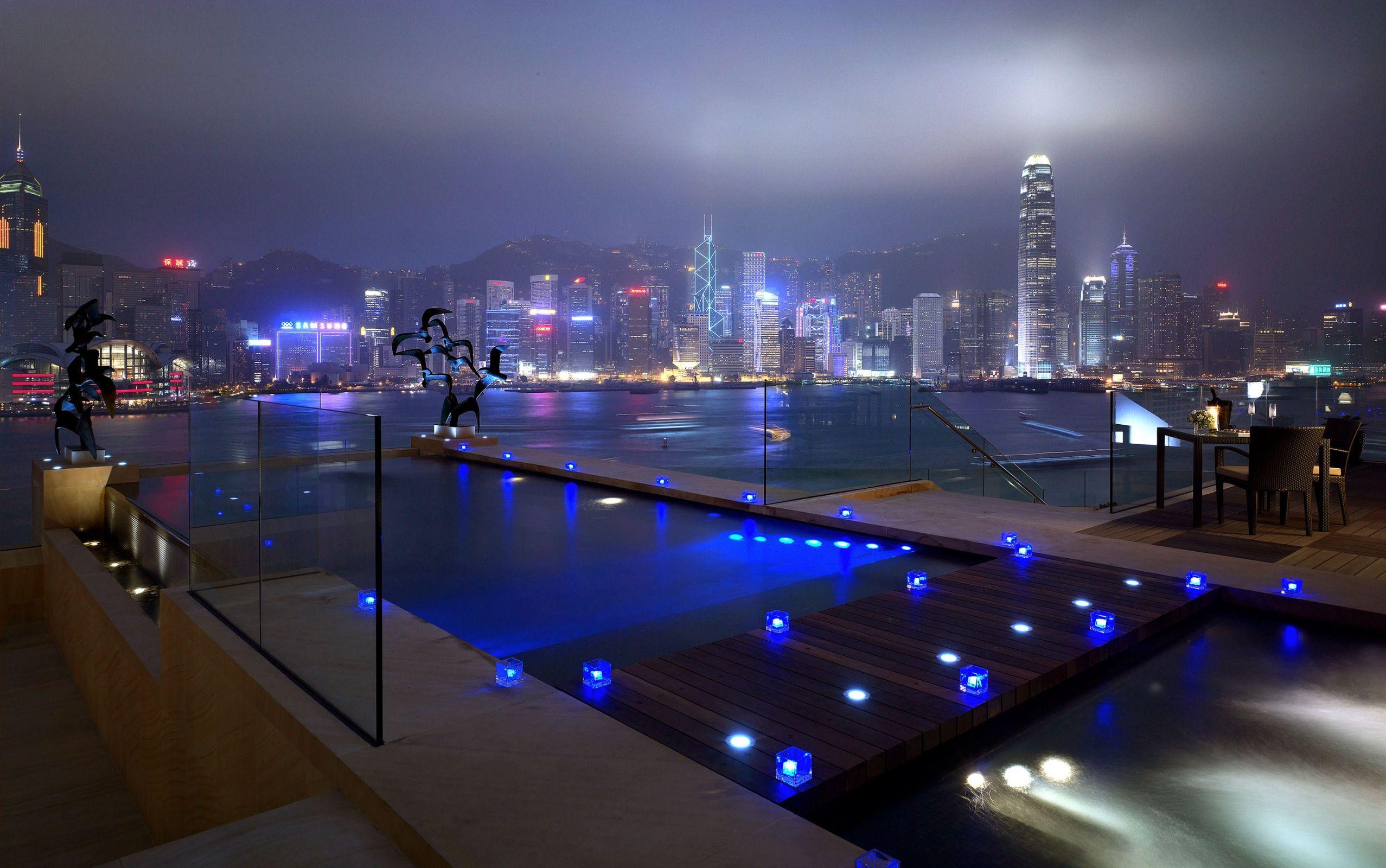 2555x1600 Download wallpaper 2555x1600 pool, city, houses, roads