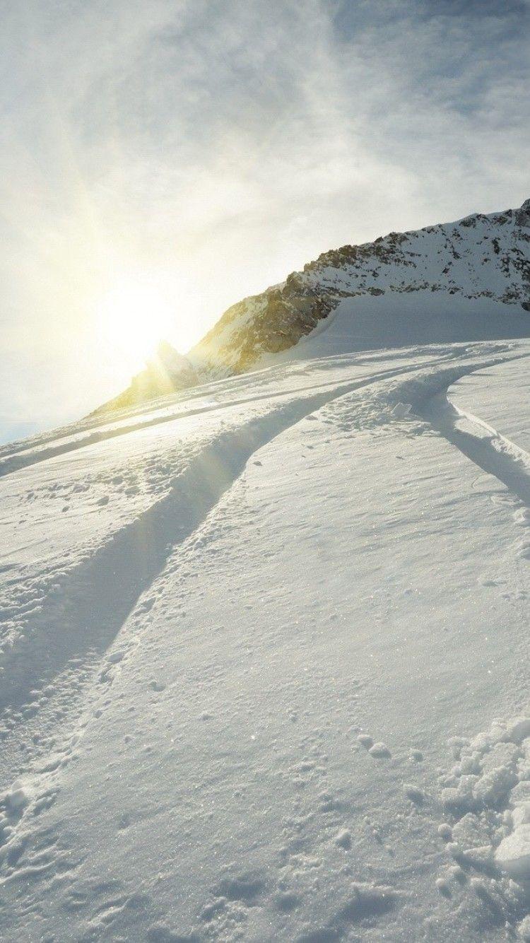 750x1334 Download 750x1334 Snowboard, Sunlight, Mountain Wallpaper