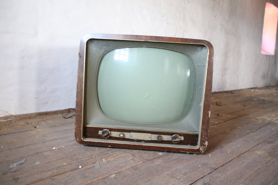 1125x750 Vintage Brown Crt Tv on Parquet Wood Flooring · Free