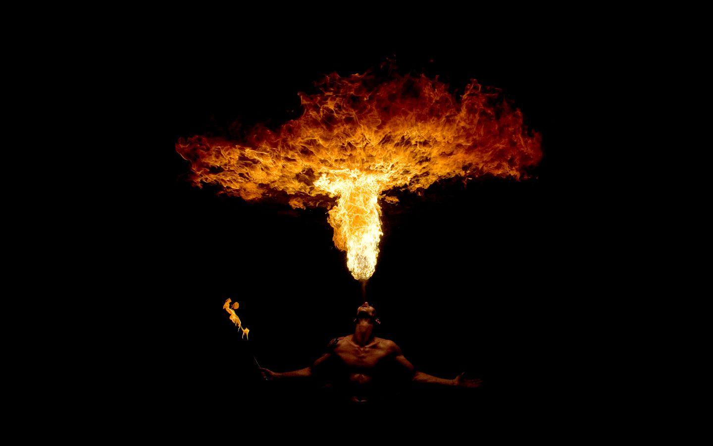 1440x900 Firefighter black background fire dancing wallpaper