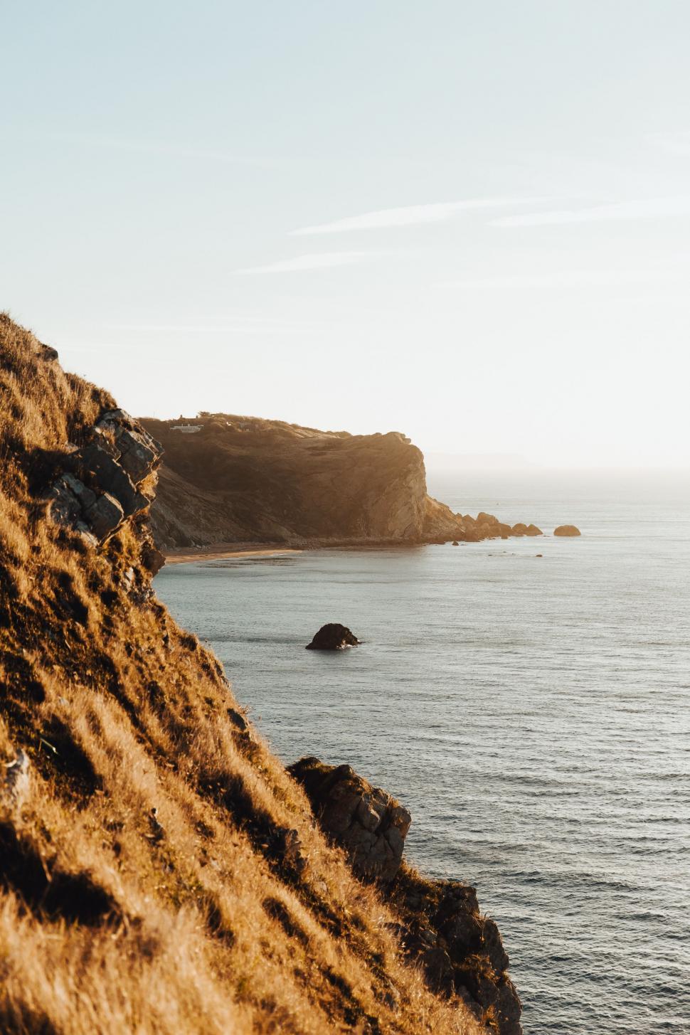 970x1455 Standing on Cliff Overlooking Ocean