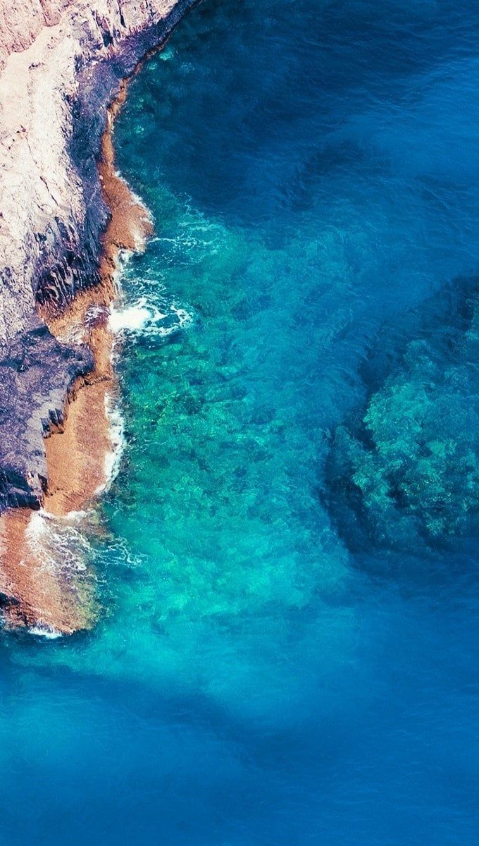 680x1200 Cliff in the sea Wallpaper Full HD
